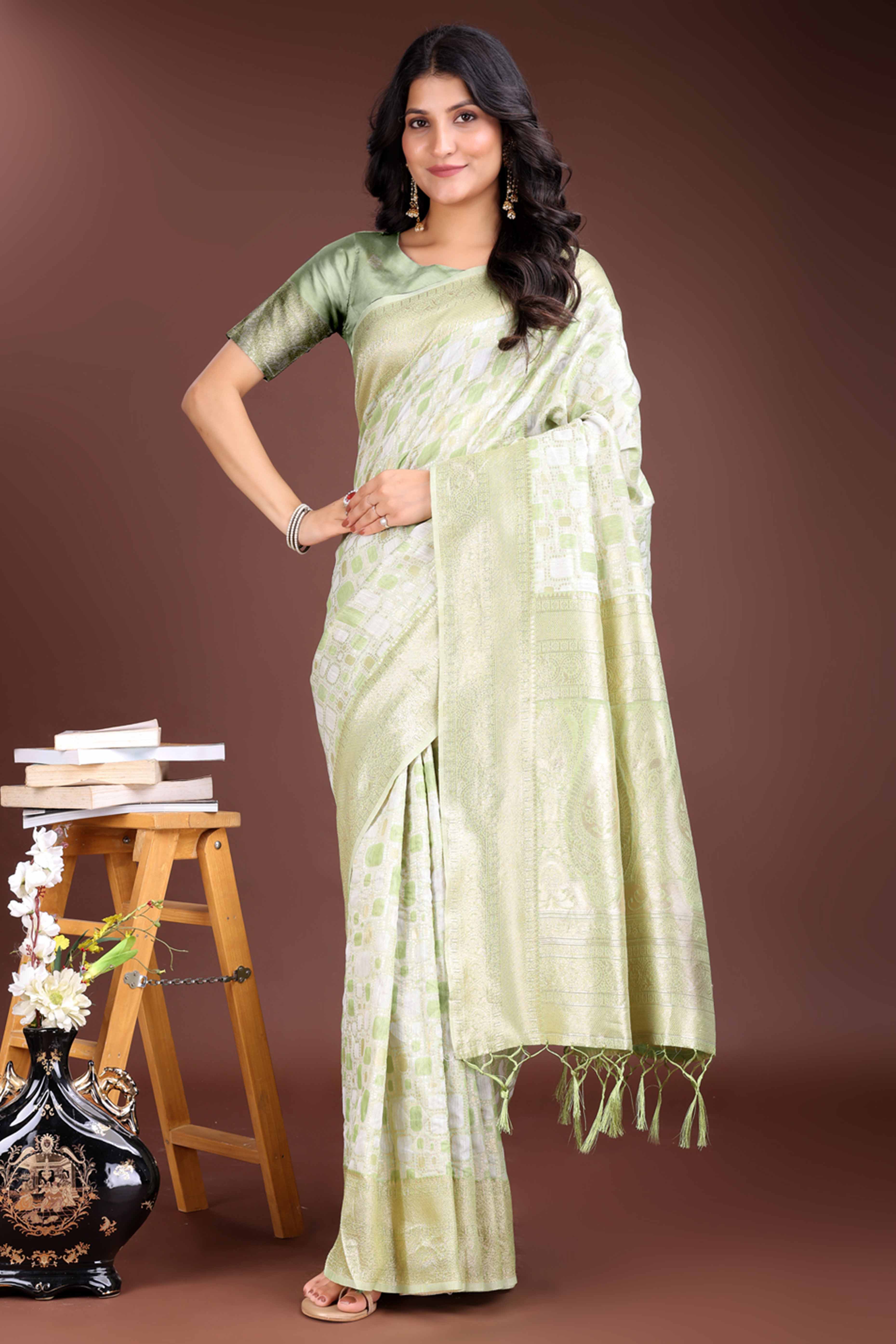 Stunning Light Green Geometric Style Zari Weaving Cotton Blend Saree Adorned with Exquisite Tassels