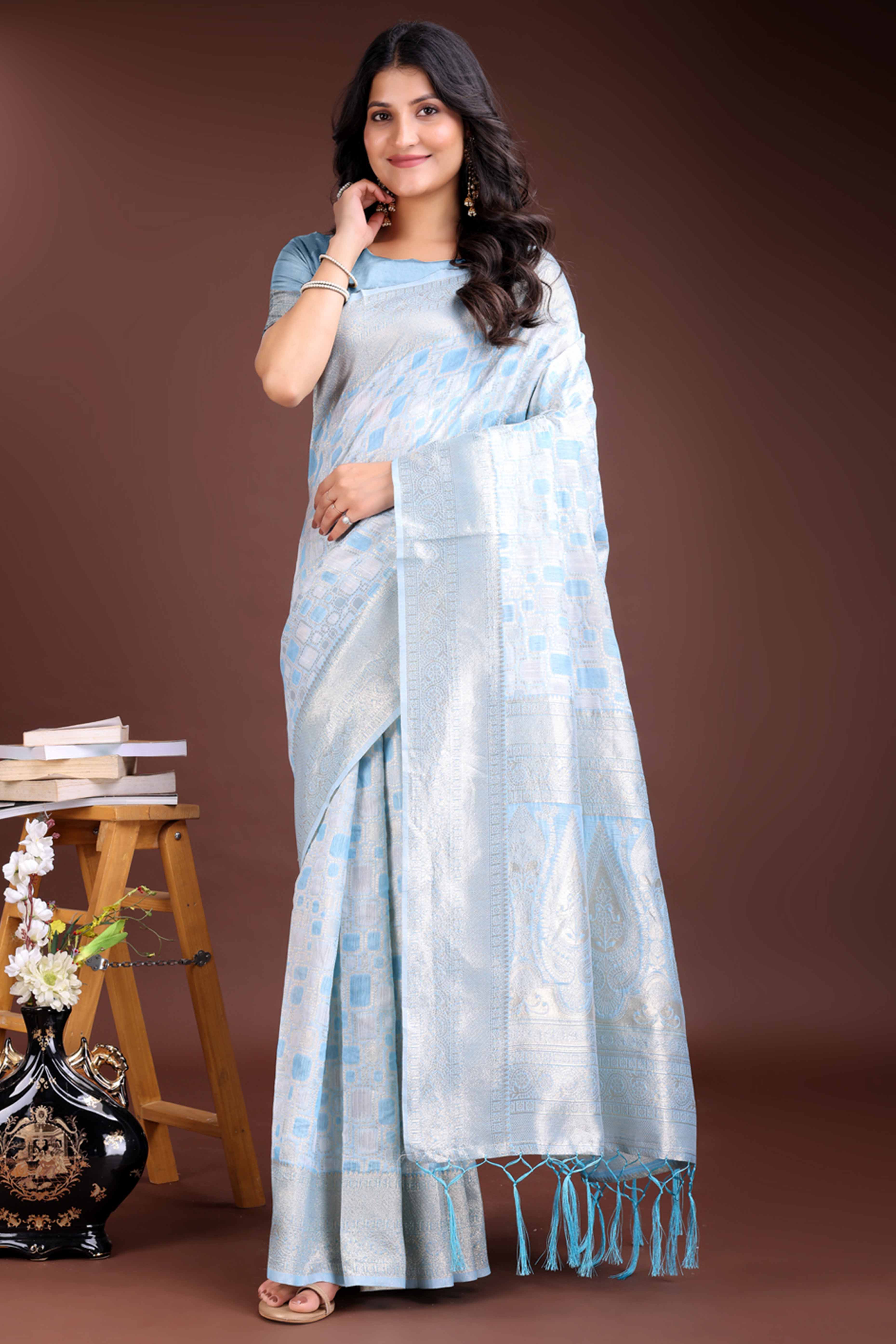 Breathtaking Sky Blue Geometric Style Zari Weaving Cotton Blend Saree Enhanced with Elegant Tassels
