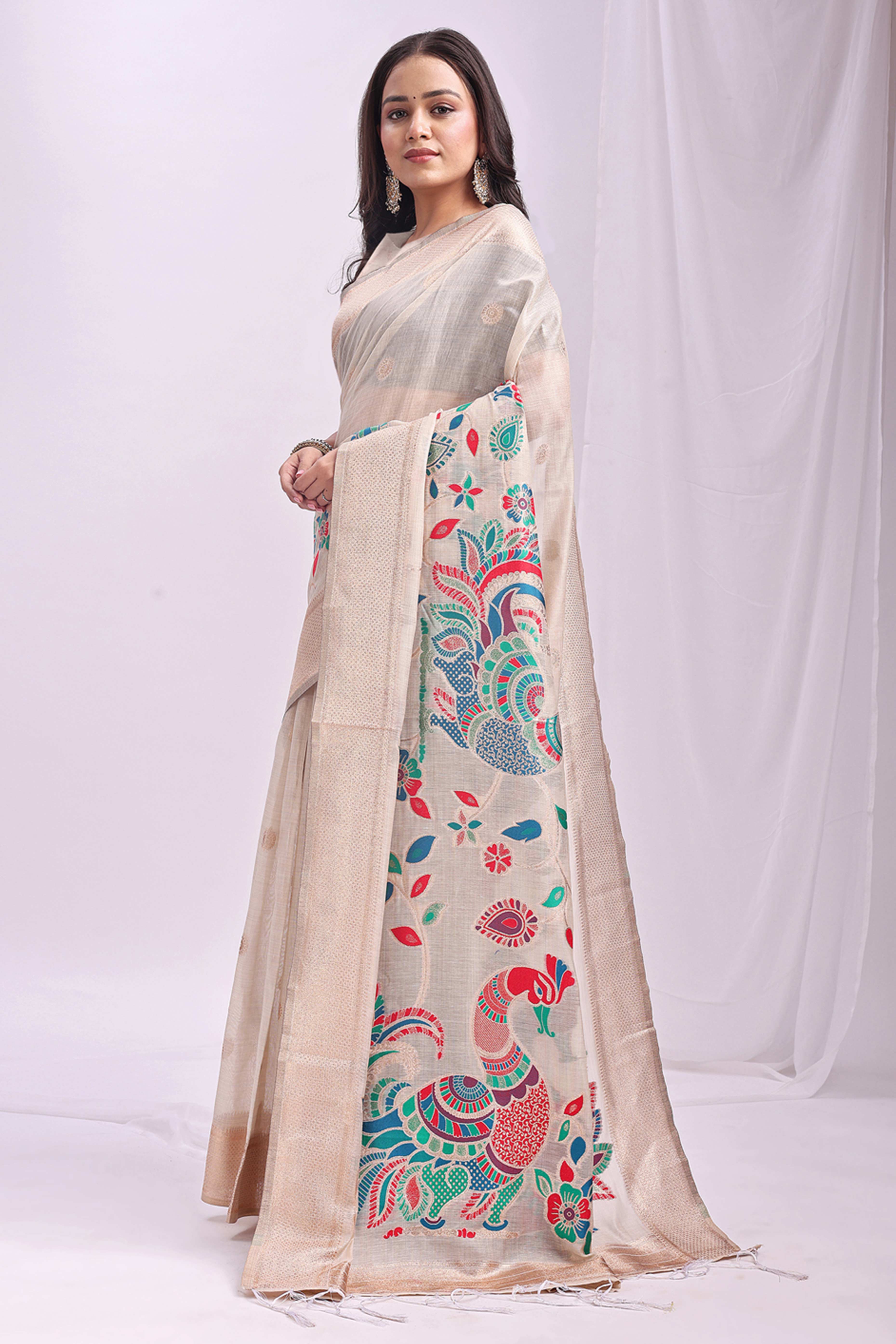Cream Floral Woven Linen Cotton Saree Accented With Peacock Motif Pallu & Zari Border
