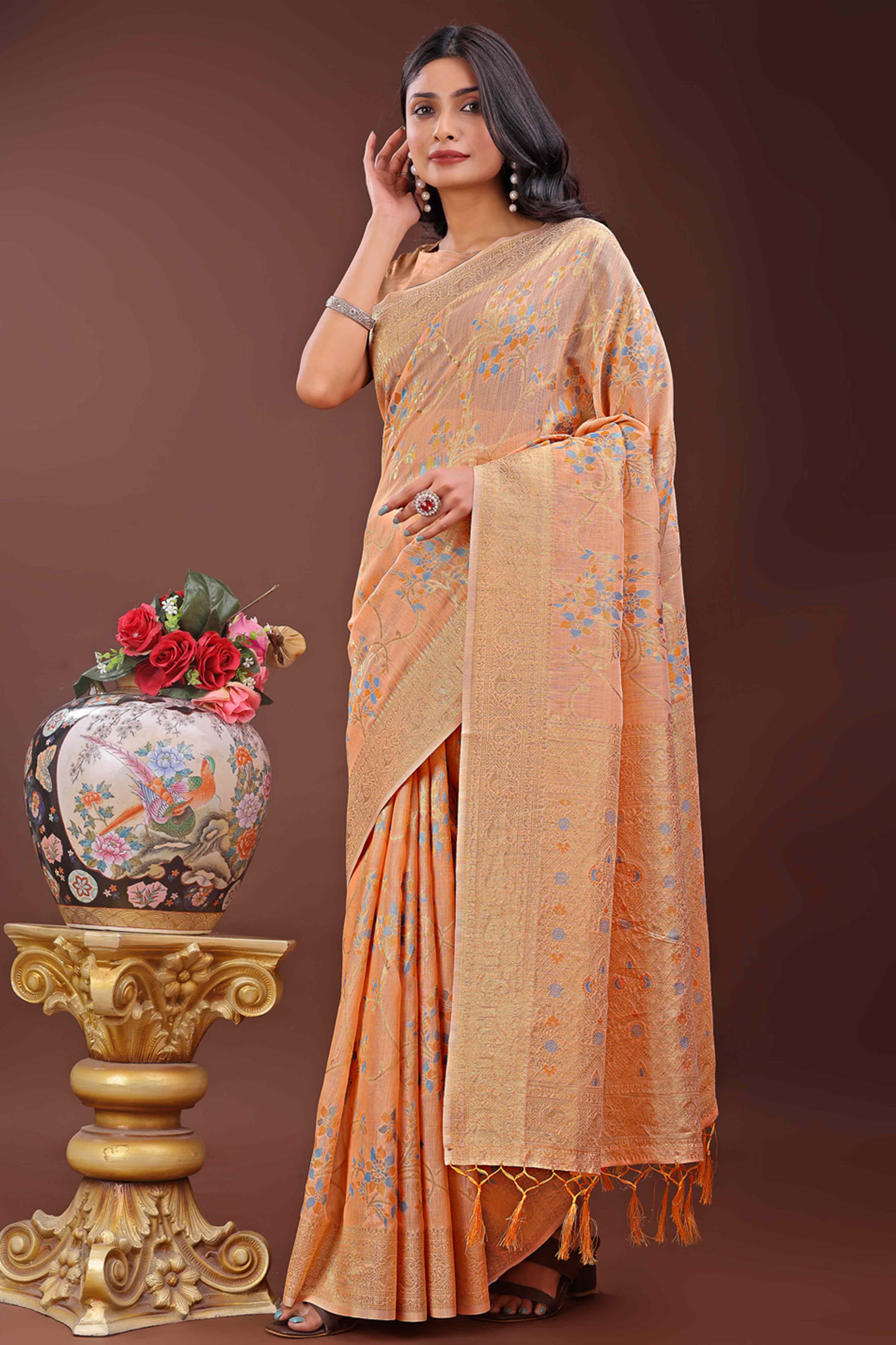 Orange Linen Cotton Saree With Intricate Floral Zari Weaving & Tassel Edge