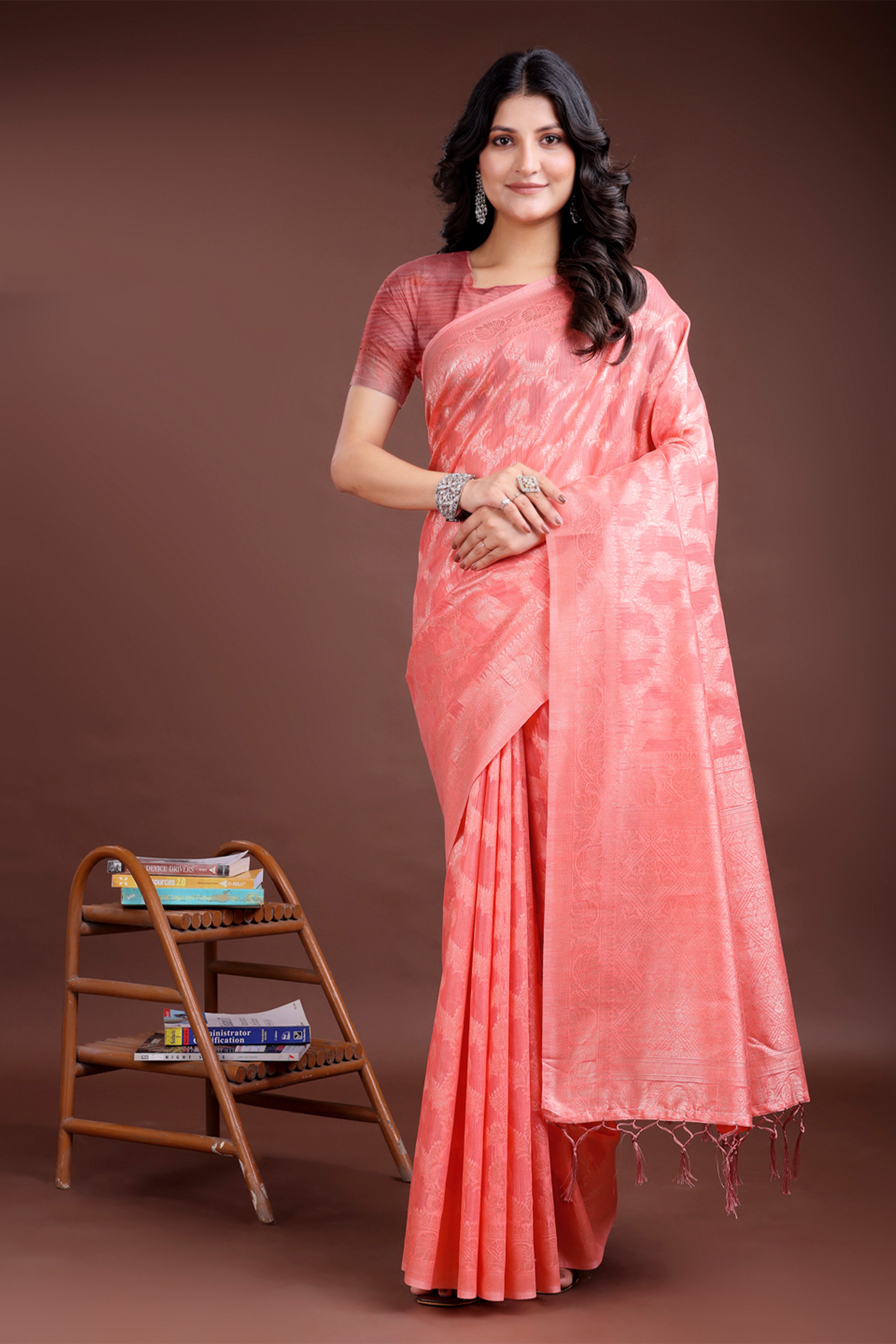 Peach Linen Cotton Saree with Lustrous Zari Borders and Elegant Tassel Accents