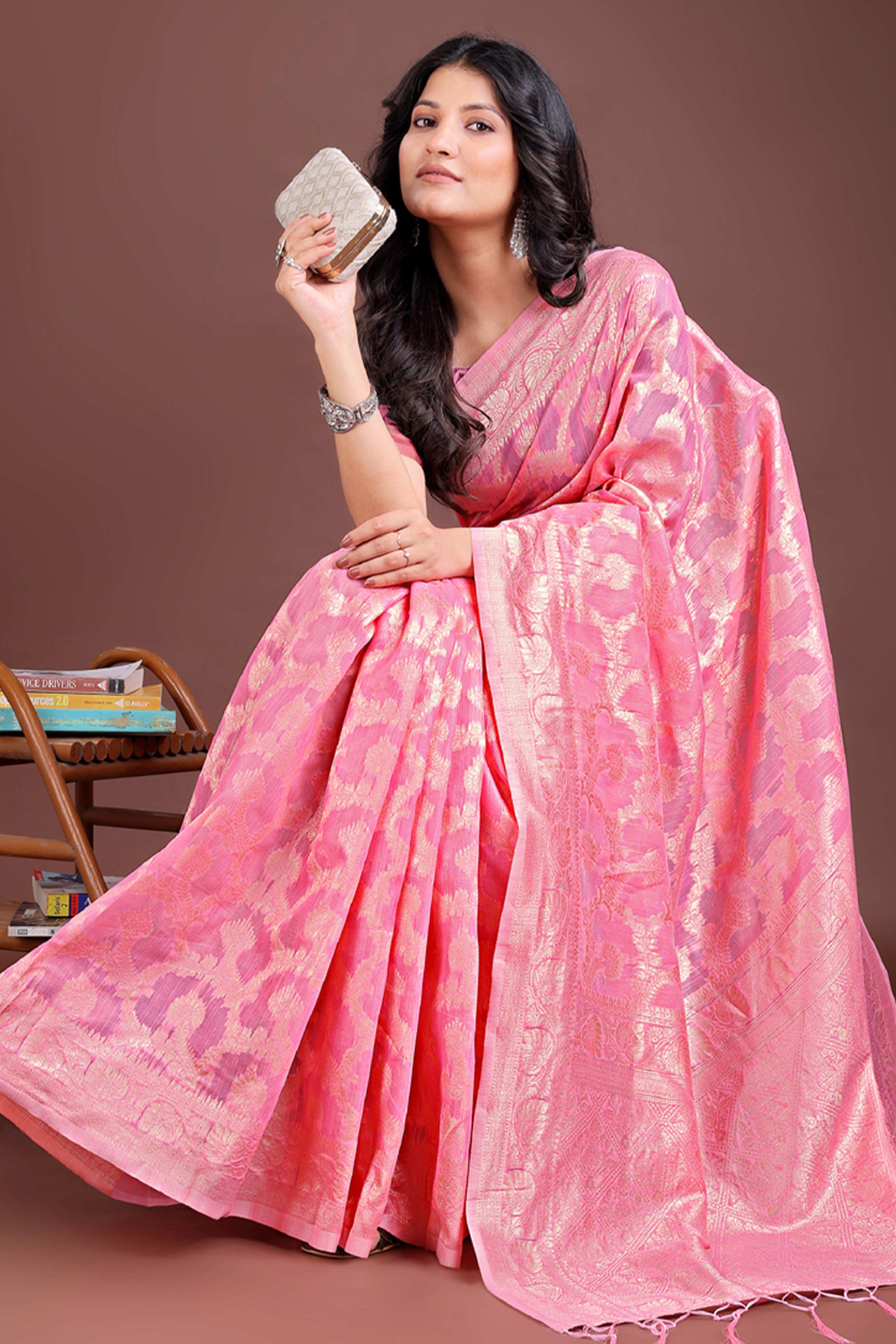 Pink Linen Cotton Saree with Lustrous Zari Borders and Elegant Tassel Accents