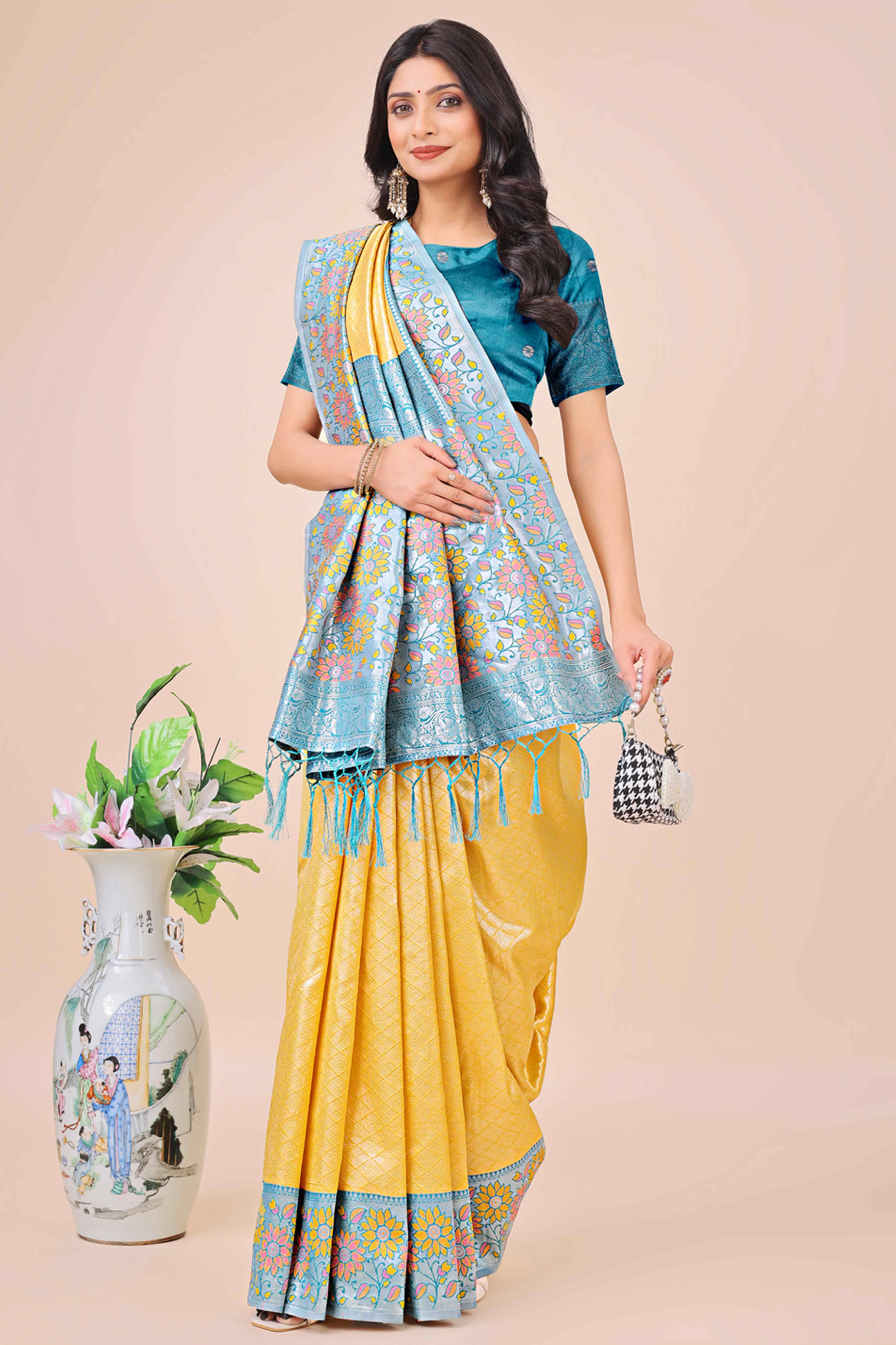 Yellow Lichi Silk Blend Saree With Exquisite Floral Weaving & Graceful Tassel Details