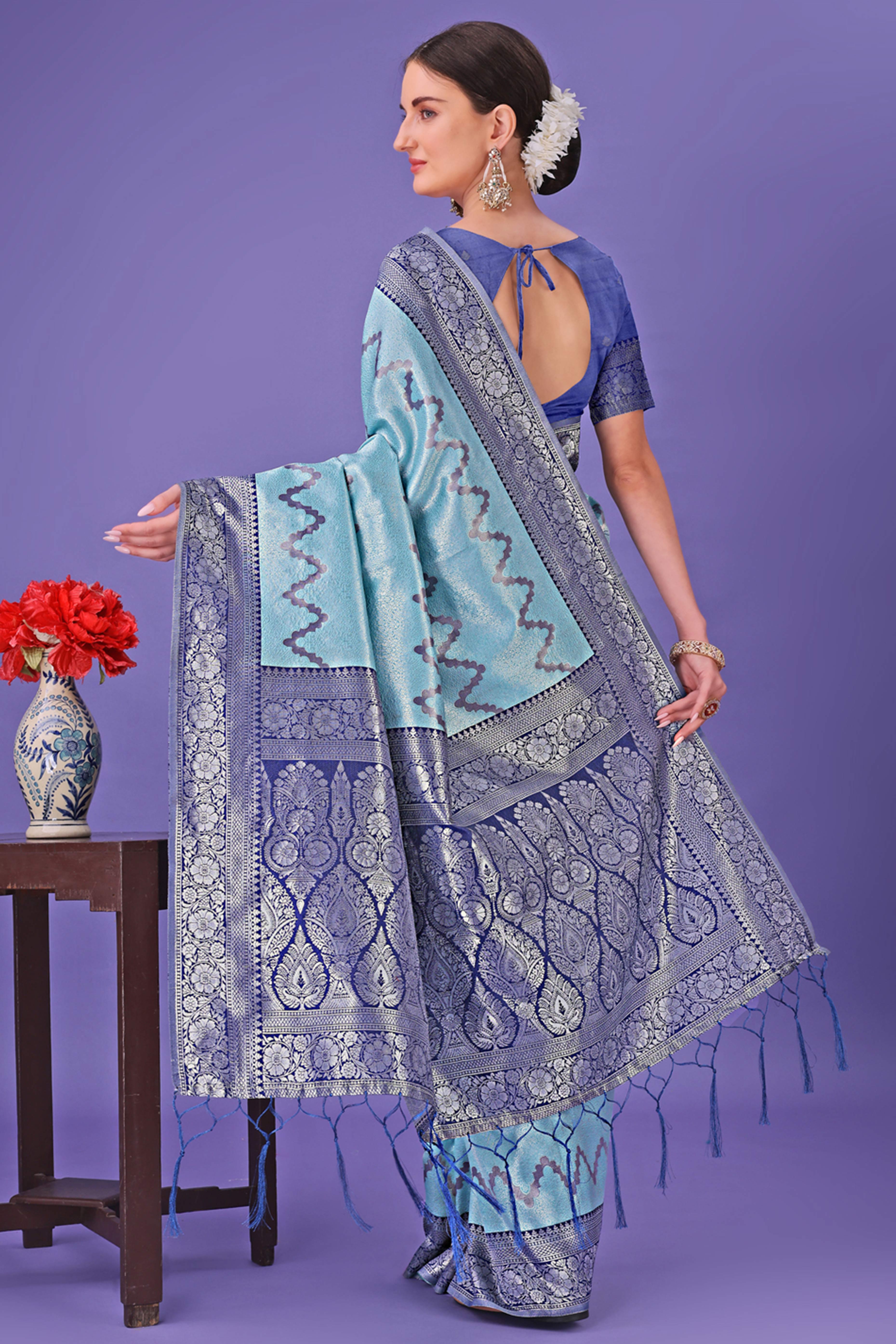 Sky Blue Lichi Cotton Silk Saree Adorned With Floral Zari Weave & Tassels
