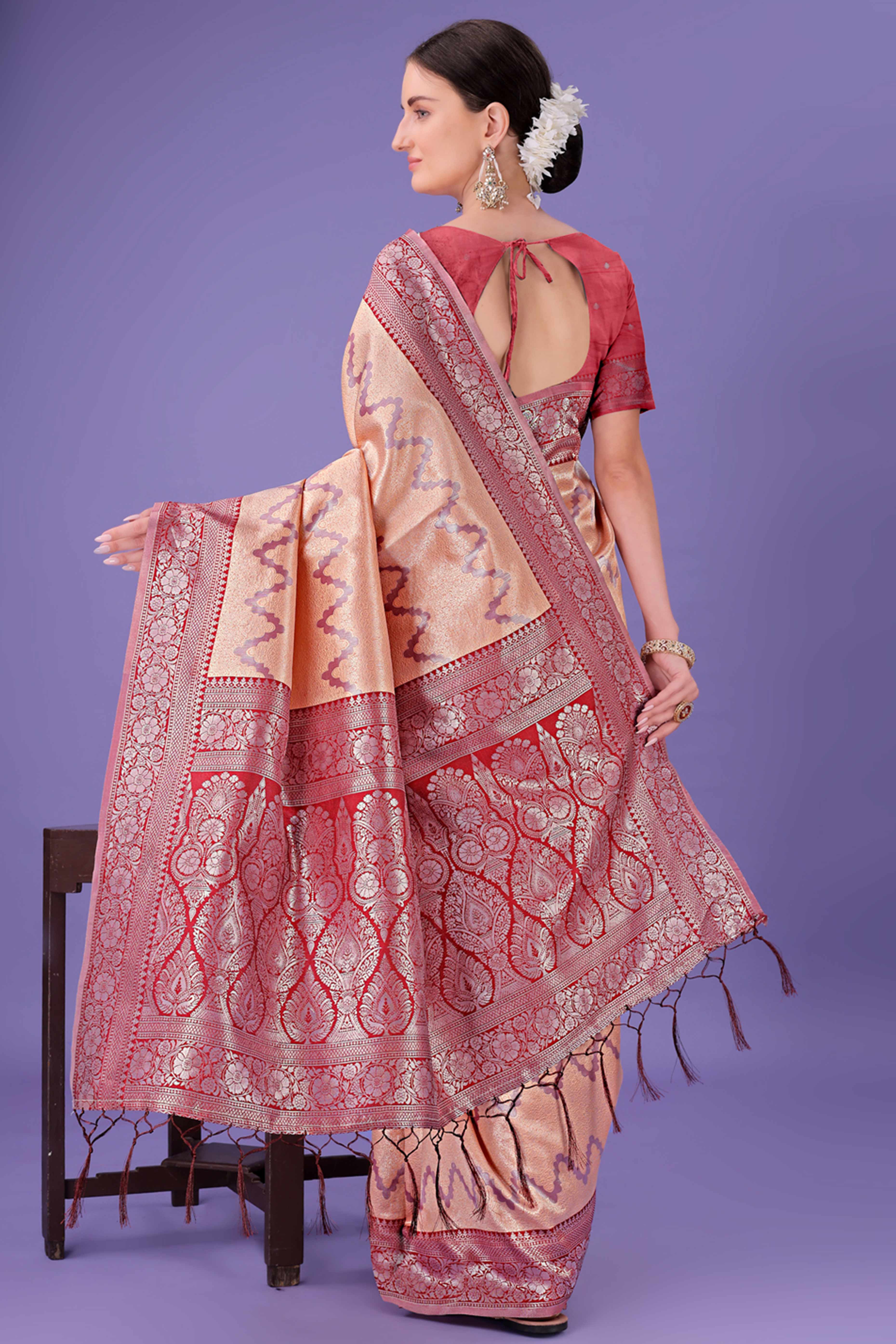 Peach Lichi Cotton Silk Saree Adorned With Floral Zari Weave & Tassels