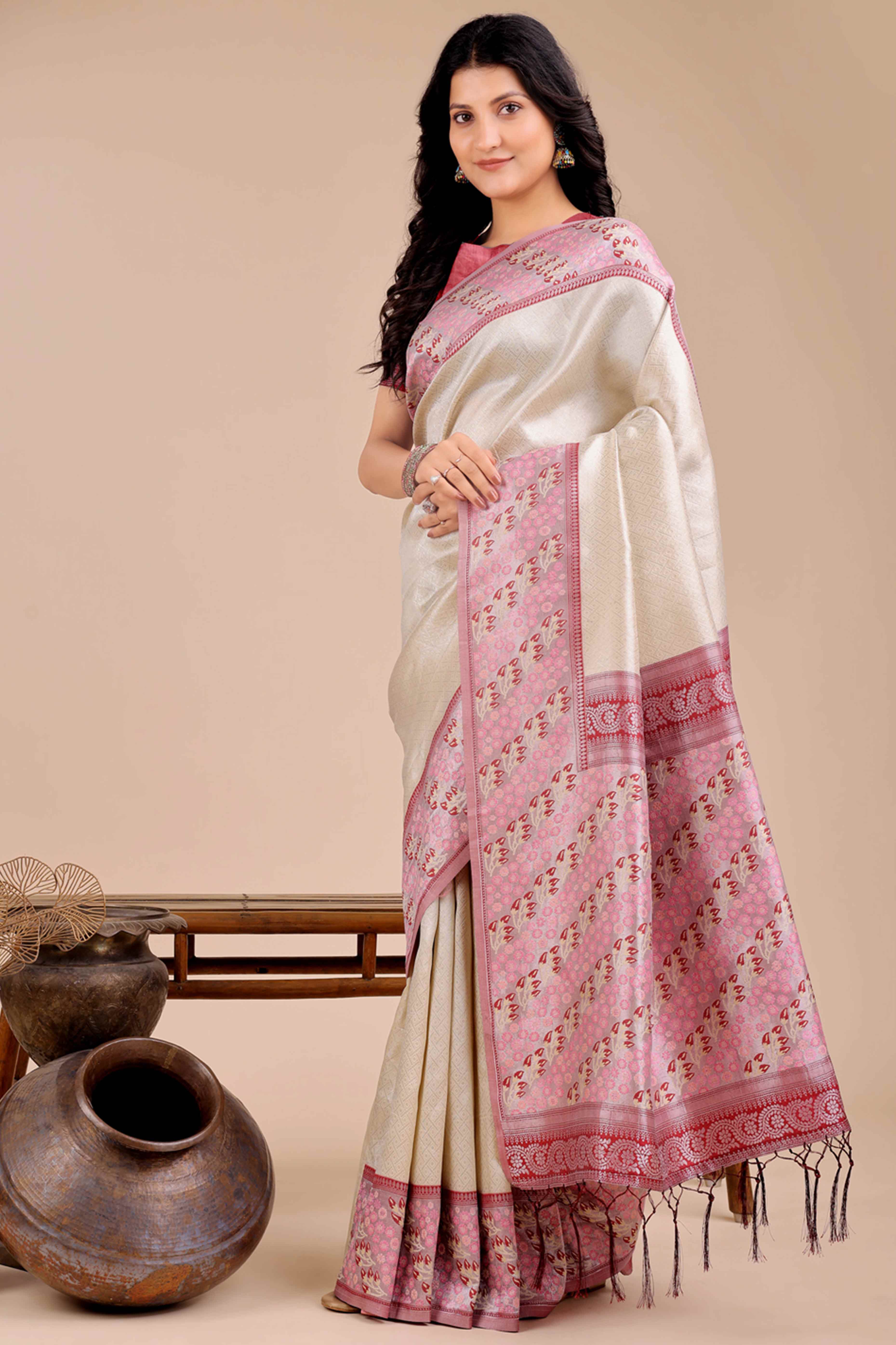 Cream Silk Blend Saree Embellished With Zari Weaving & Tassel Accents