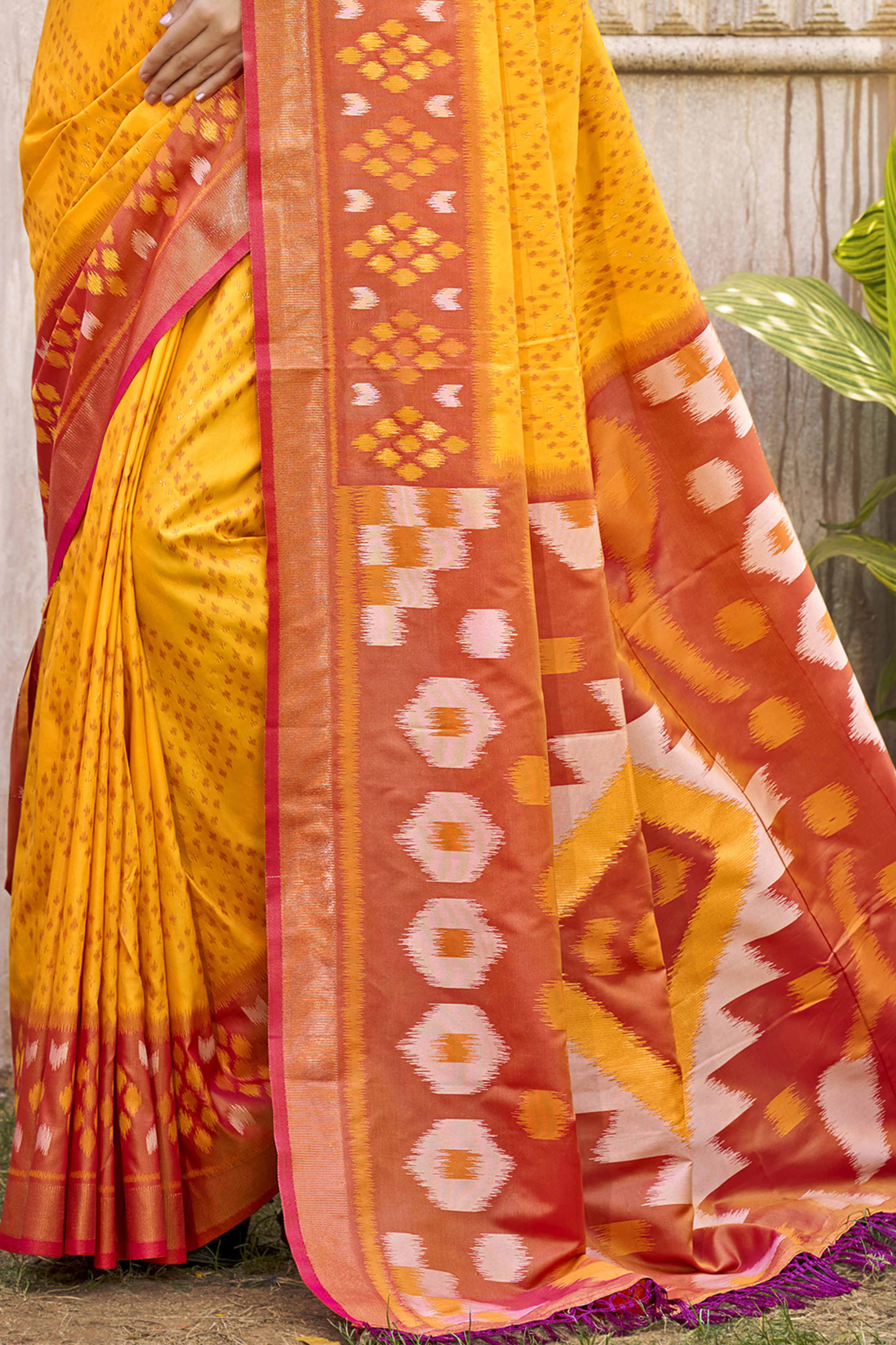 Yellow Ikkat Woven Silk Saree for Festive Celebrations