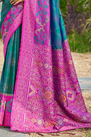 Graceful Morpich Blue Pochampally Silk Blend Saree Adorned With Floral Weaving & Tassel Pallu