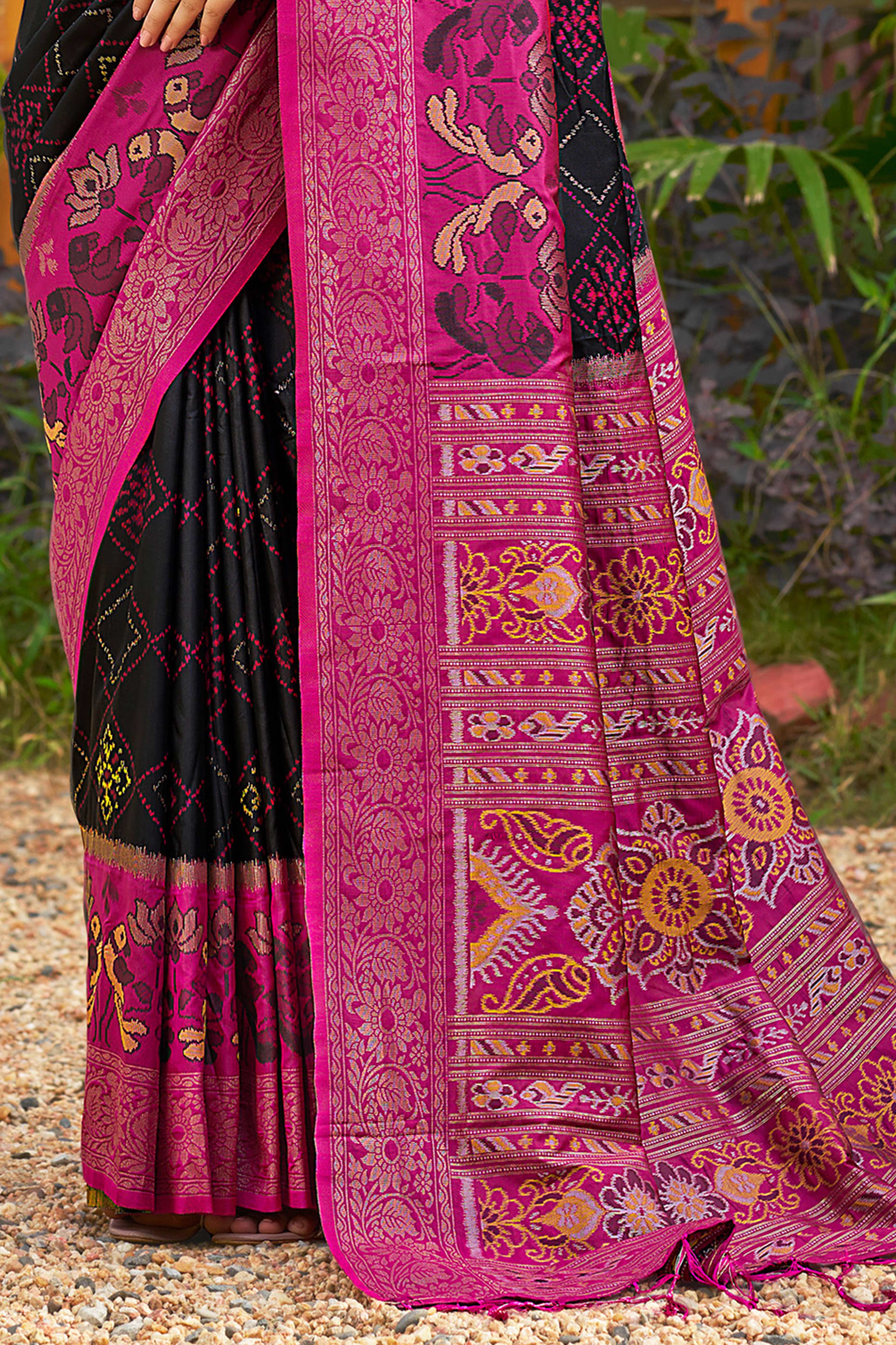 Graceful Black Pochampally Silk Blend Saree Adorned With Floral Weaving & Stylish Tassel Pallu