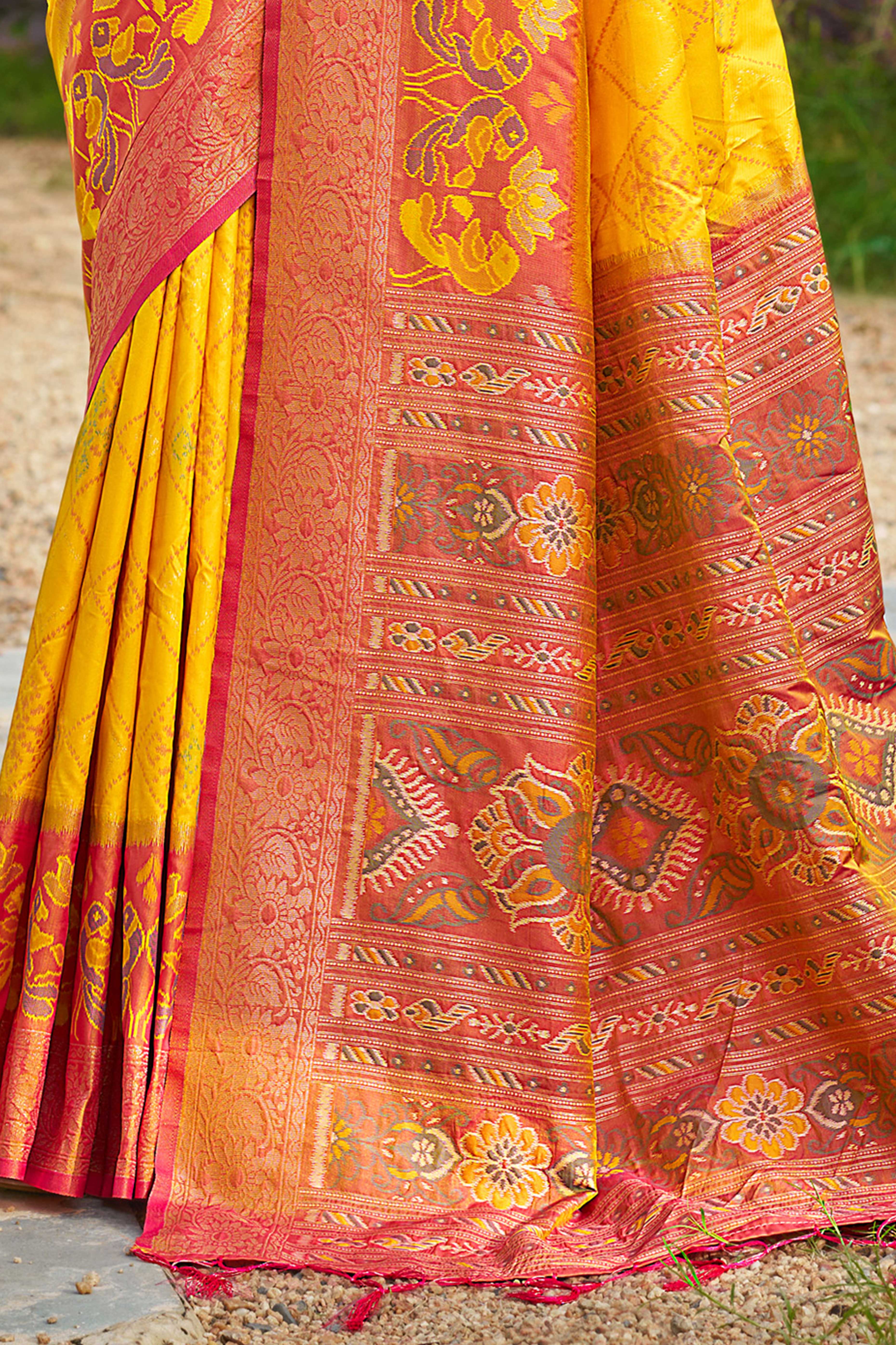 Graceful Yellow Pochampally Silk Blend Saree Adorned With Floral Weaving & Stylish Tassel Pallu