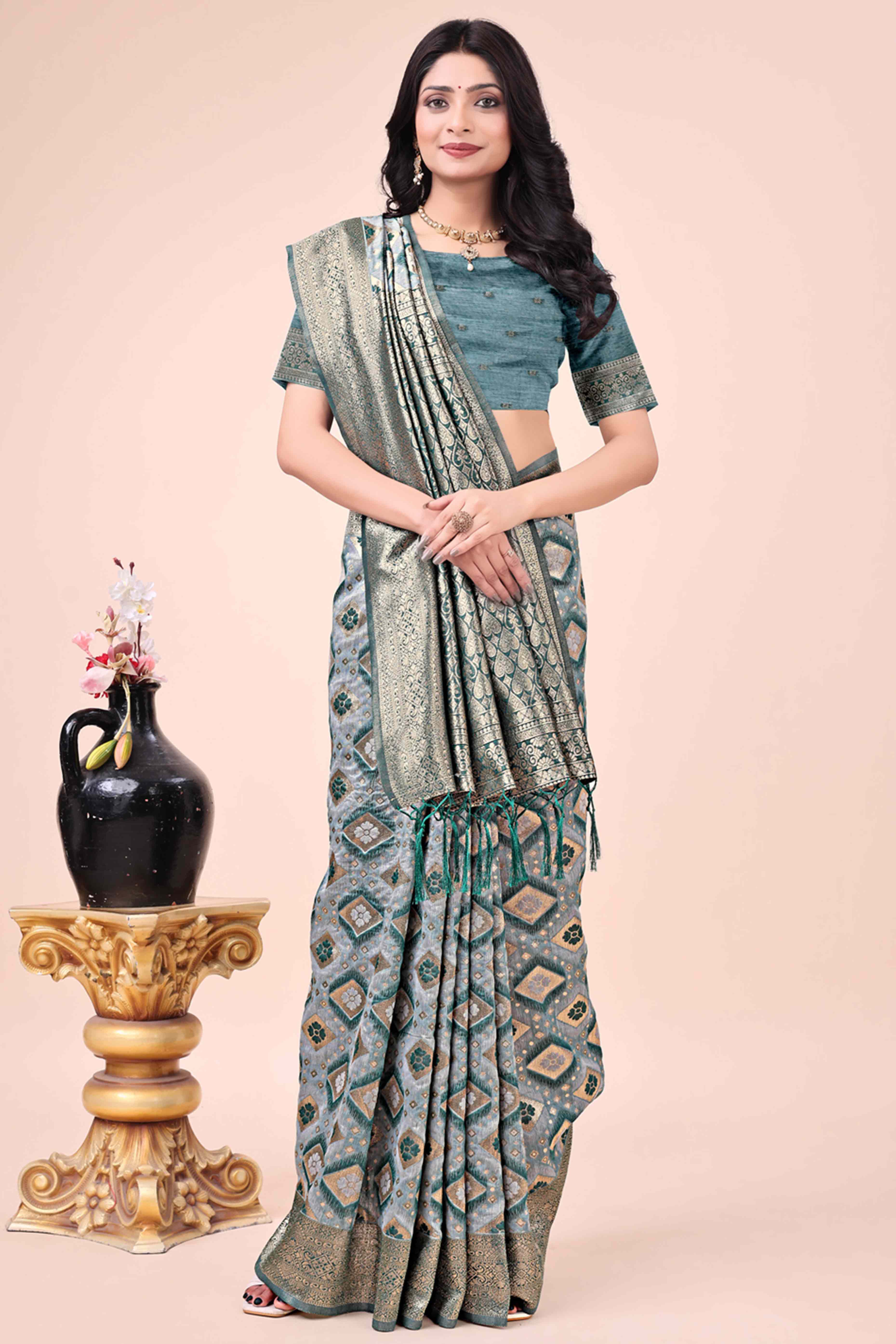 Floral Weaving On Green Cotton Blend Saree With Tassels