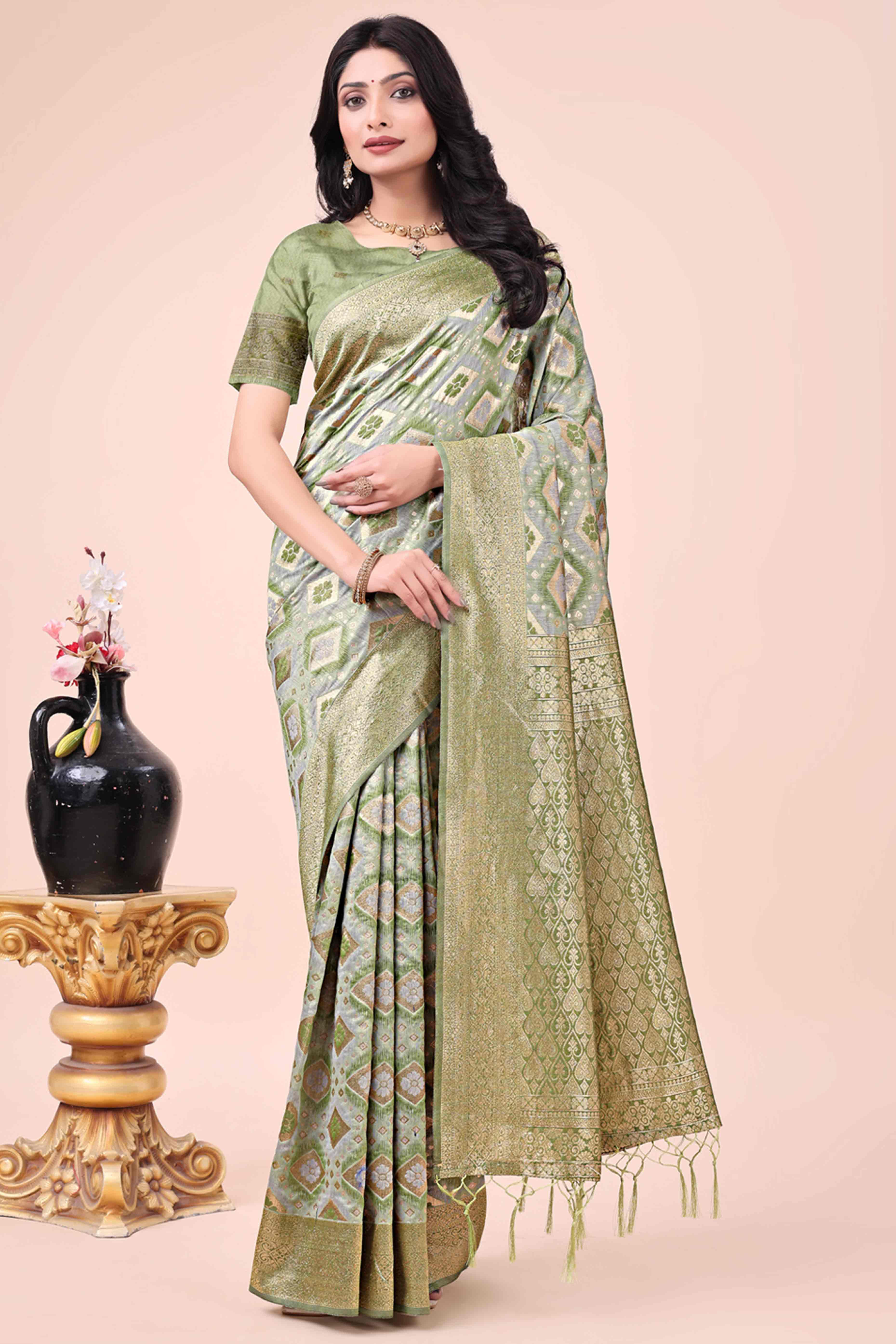 Floral Weaving On Mehendi Green Cotton Blend Saree With Tassels