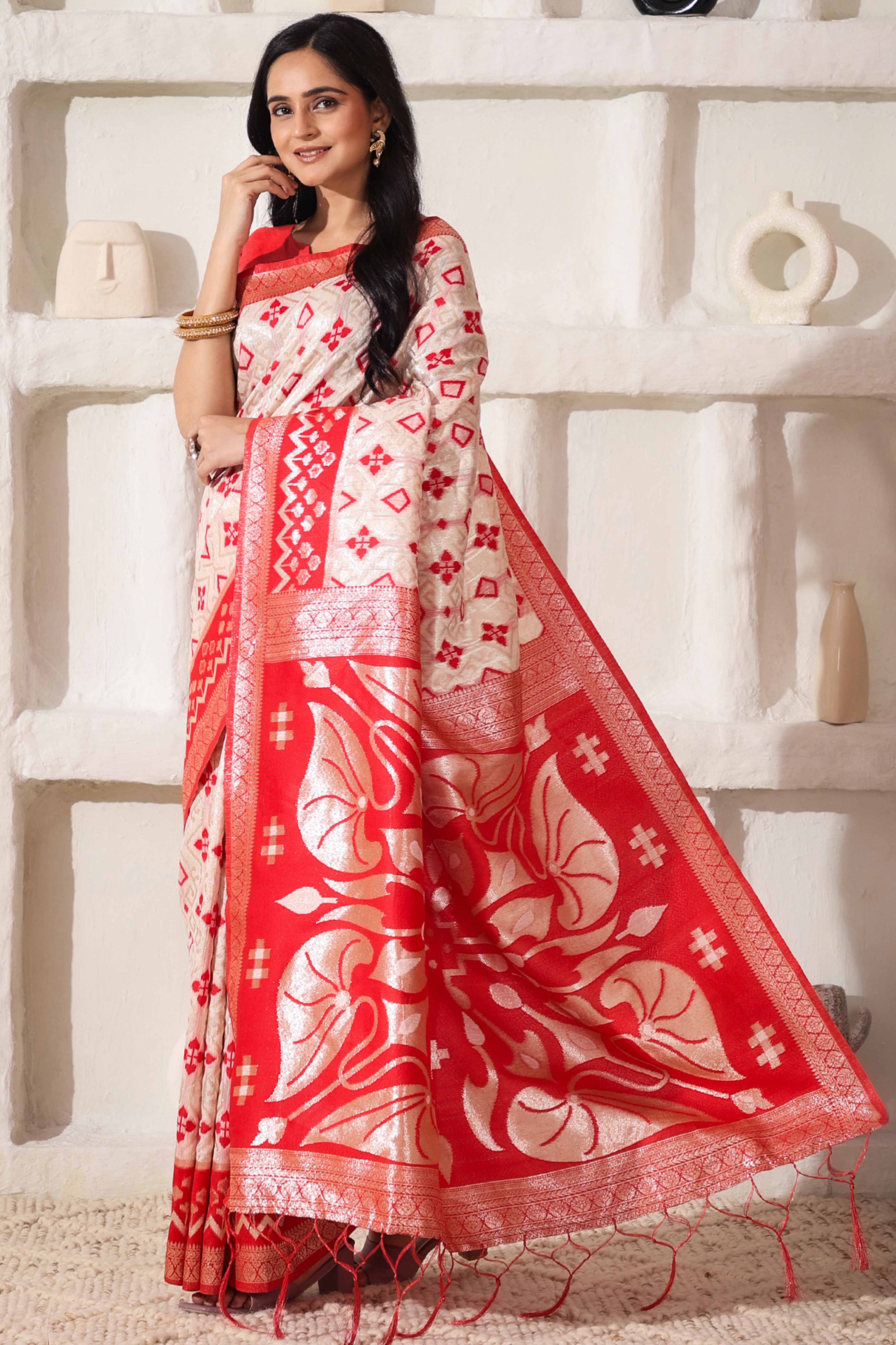 Graceful White & Red Saree In Linen Cotton With Fine Zari Weaving And Flowing Tassel Details