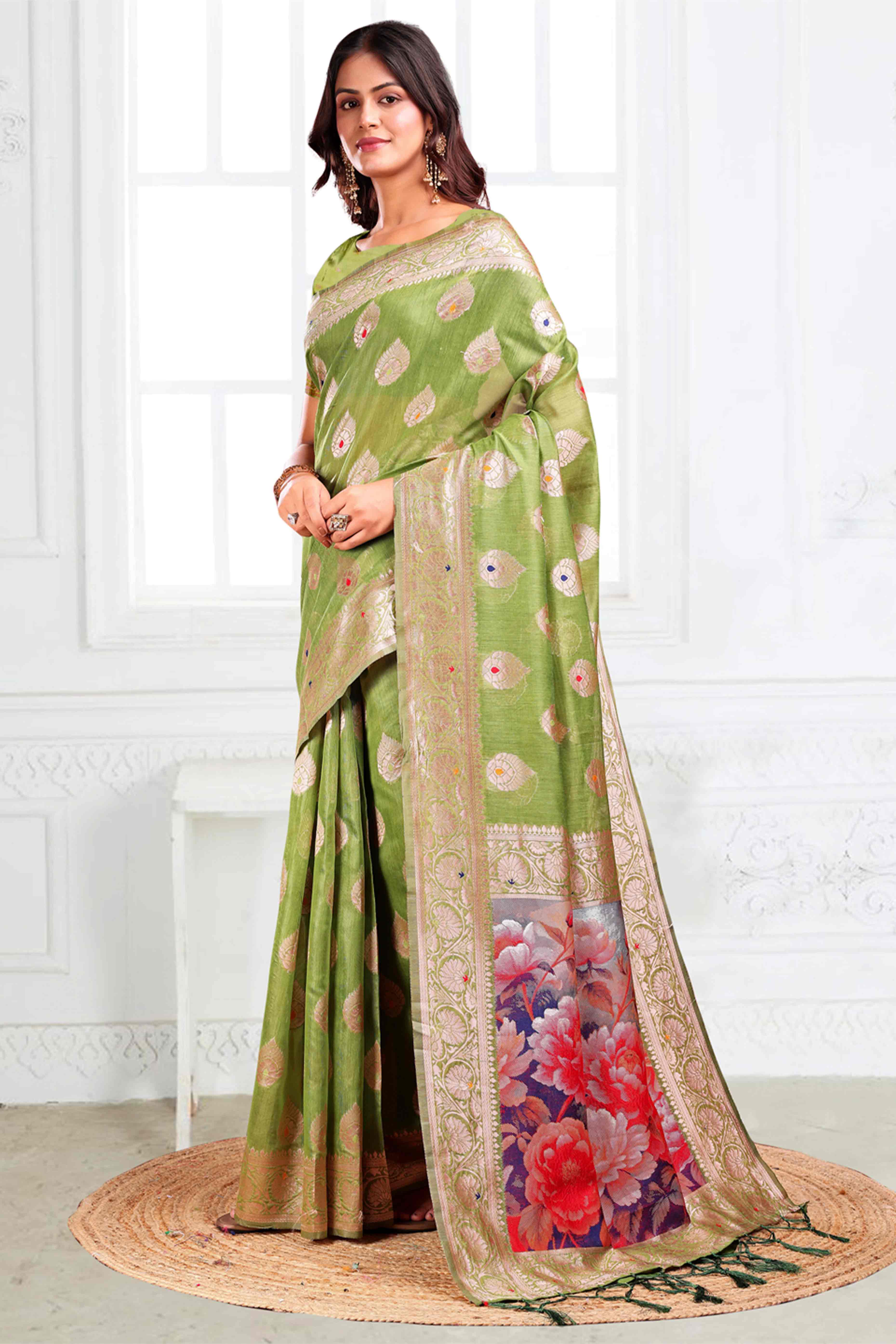 Green Linen Cotton Silk Saree Adorned With Intricate Floral Zari Weaving & Tassel Pallu