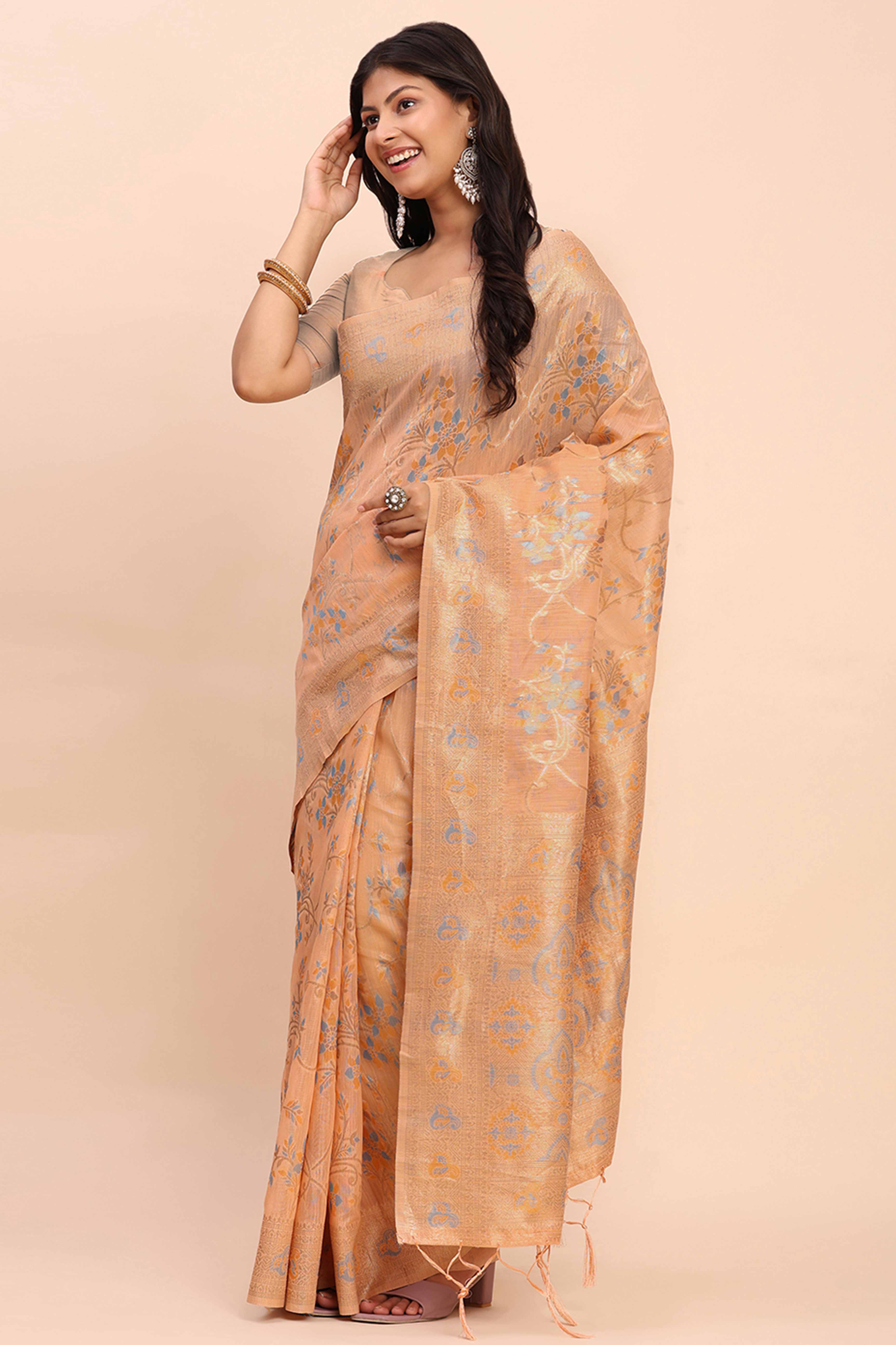 Light Orange Linen Cotton Saree Showcasing Floral Zari Weaves & A Tasselled Finish Pallu