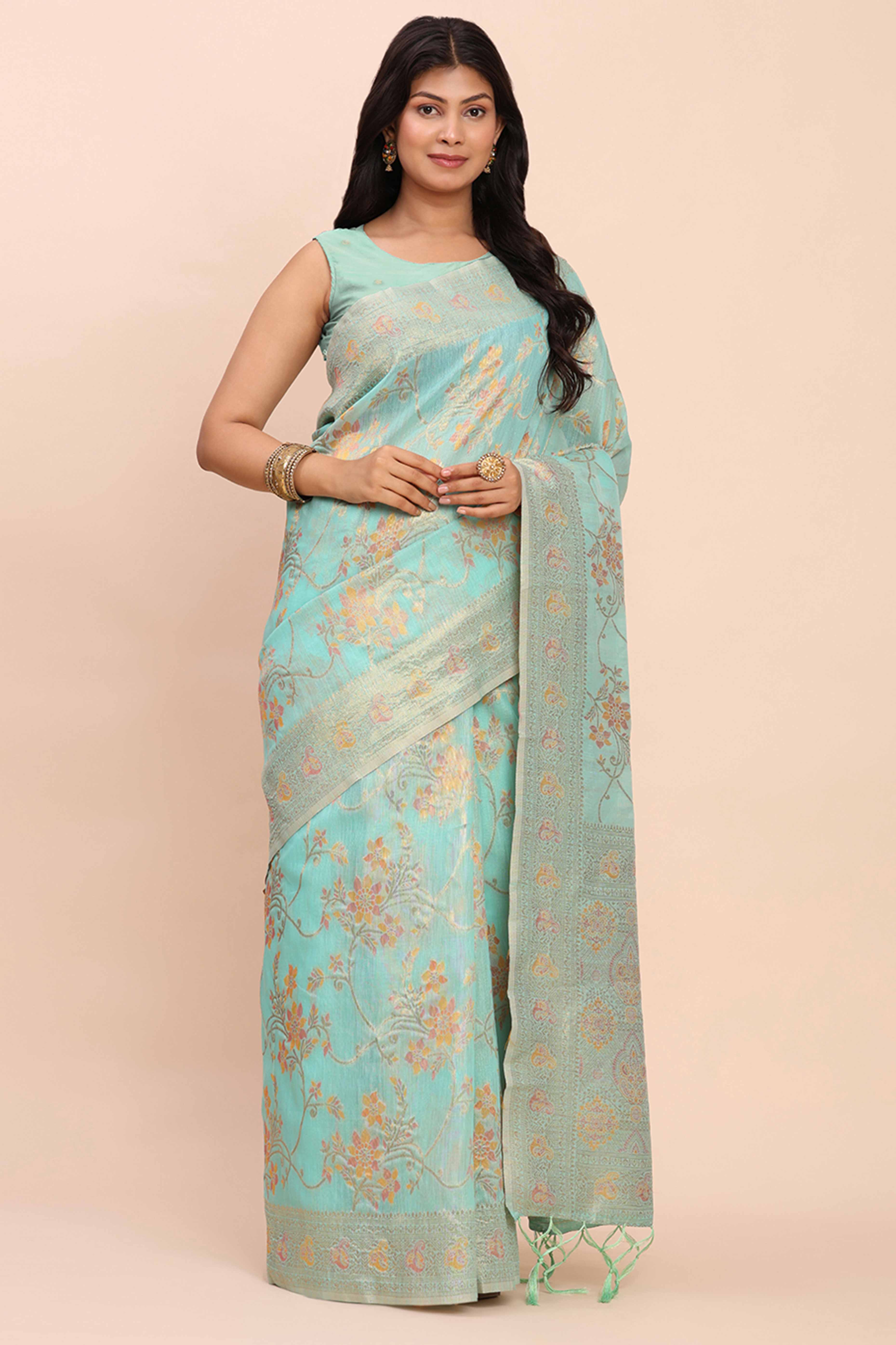 Turquoise Linen Cotton Saree Showcasing Floral Zari Weaves & A Tasselled Finish Pallu