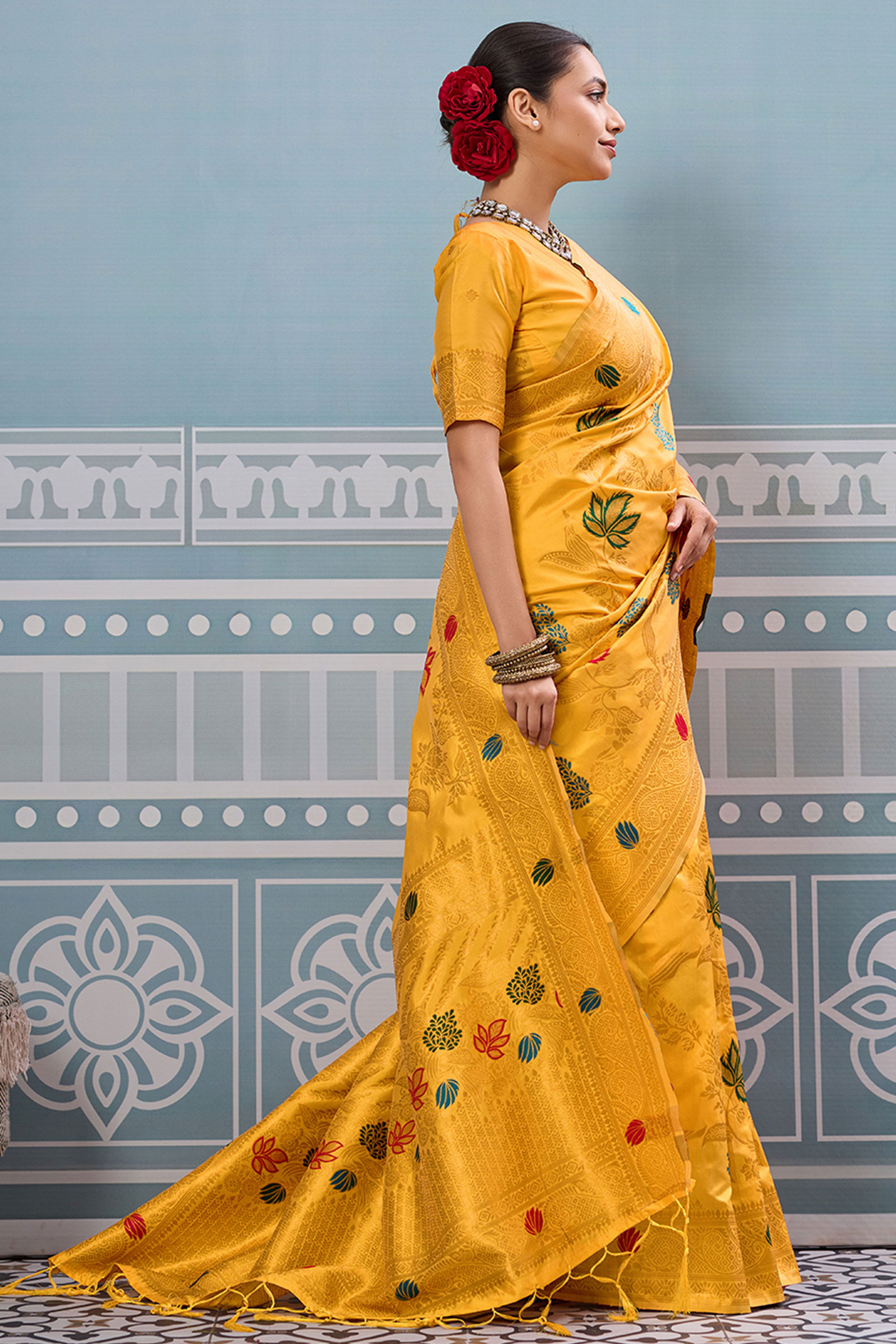 Radiant Yellow Silk Blend Saree Adorned With Intricate Floral Zari Weaving & Tassel Pallu