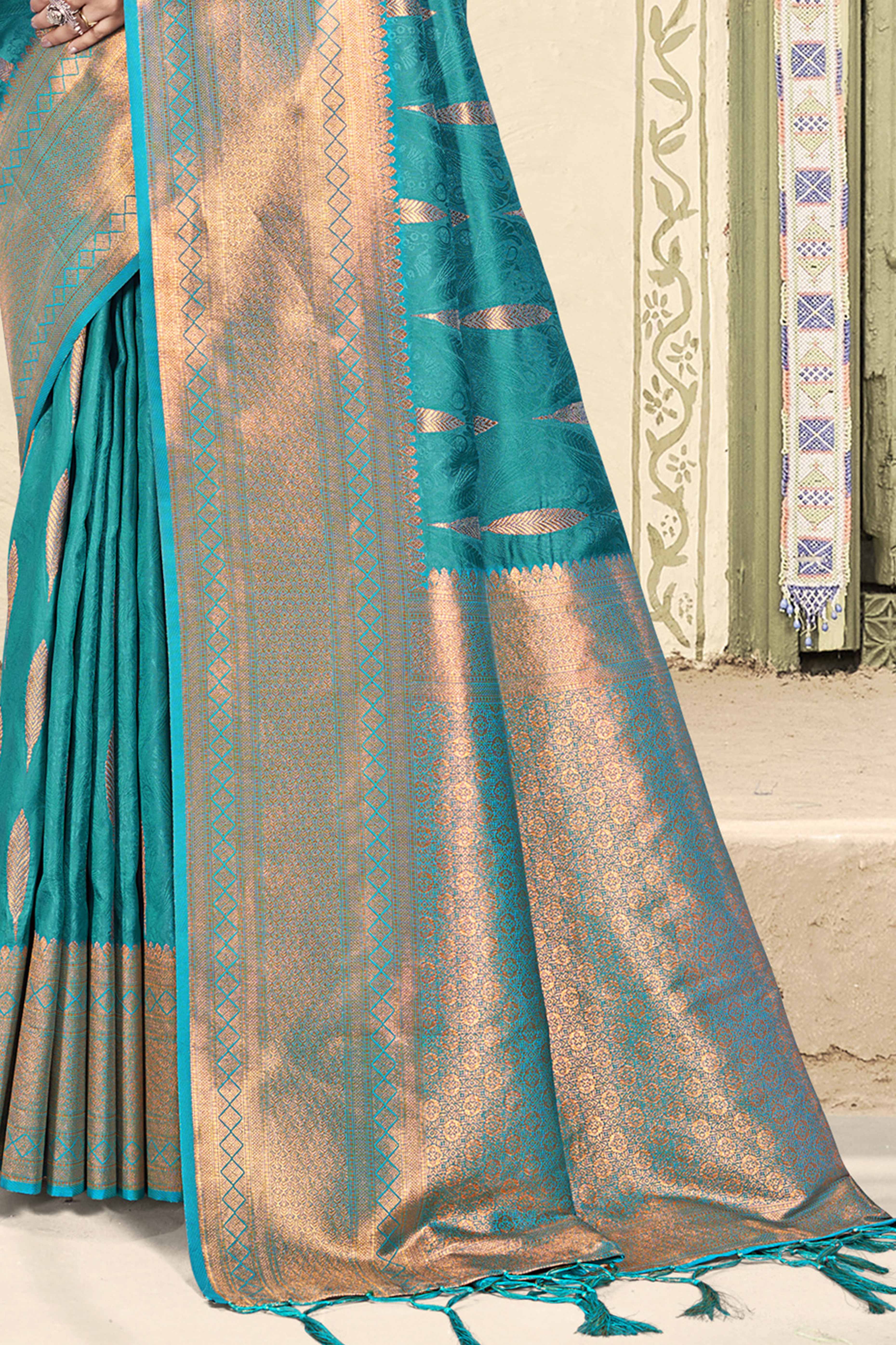 Regal Teal Blue Silk Blend Saree Enhanced With Floral Zari Work & Tassel Finish