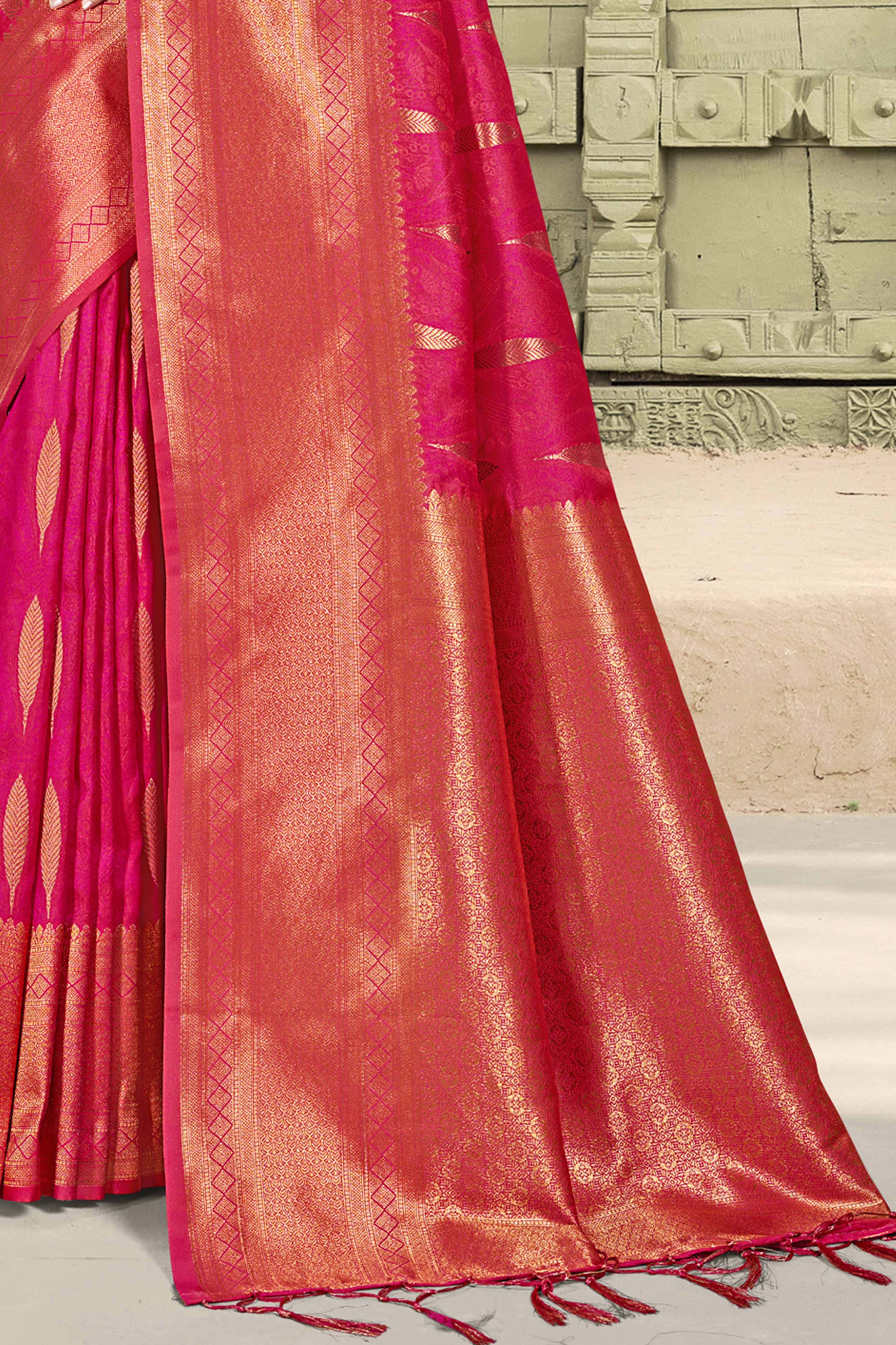Charming Rani Pink Floral Zari Weaving Saree In Lustrous Silk Blend With Tassel Detail