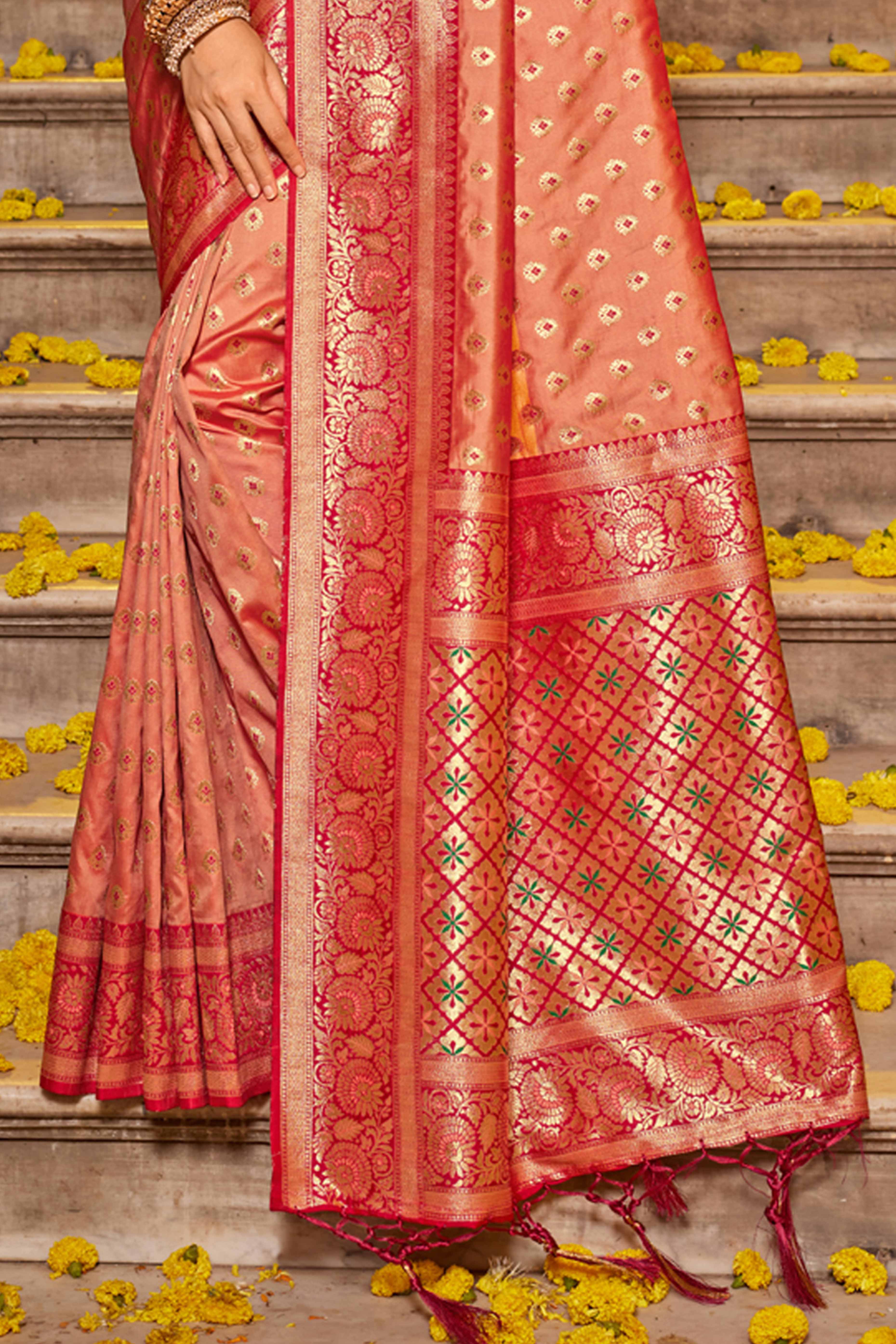 Peach Banarasi Silk Saree Featuring Intricate Floral Weaving & Elegant Tassel Pallu