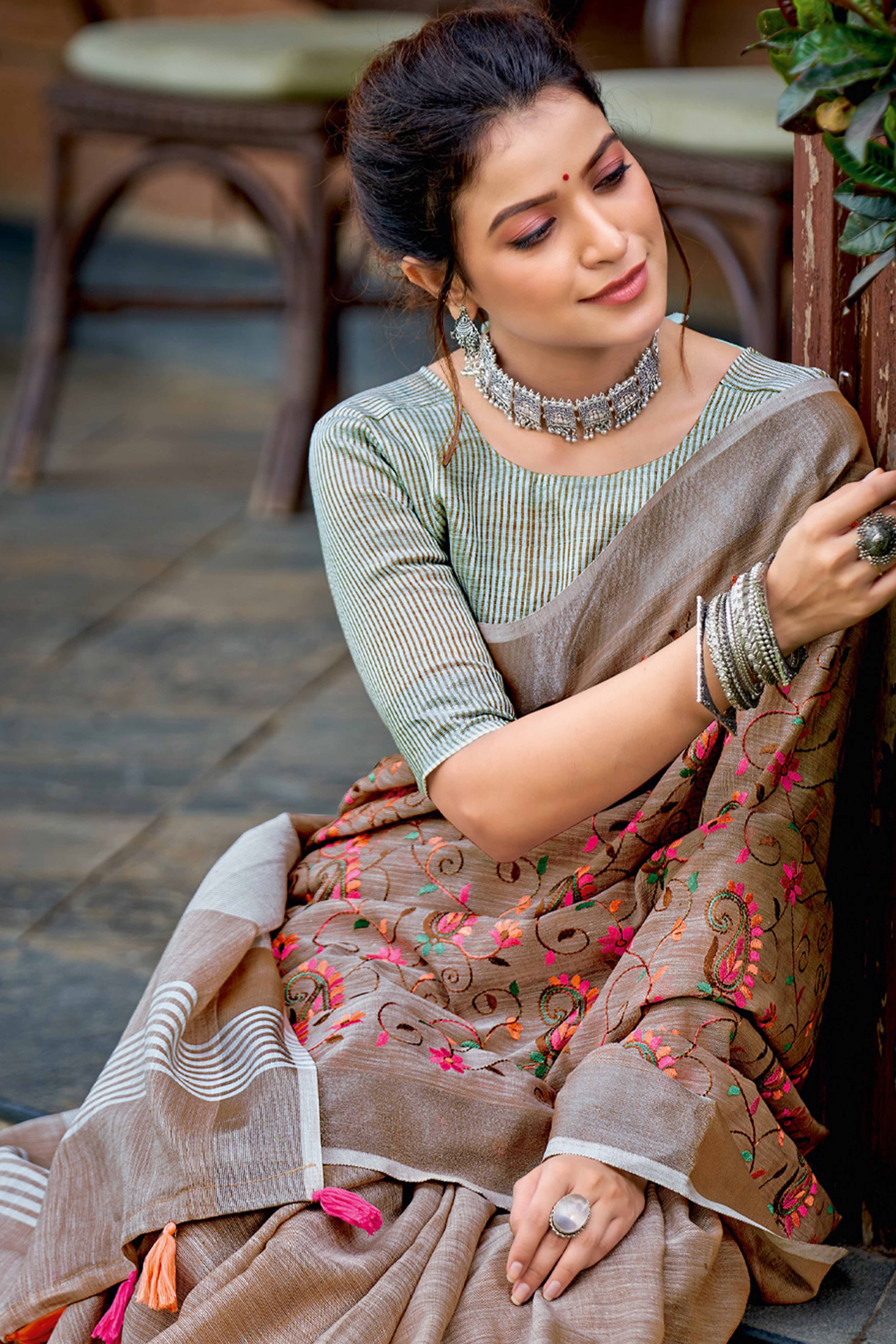 Handwoven Brown Linen Saree with Floral Embroidered Patterns