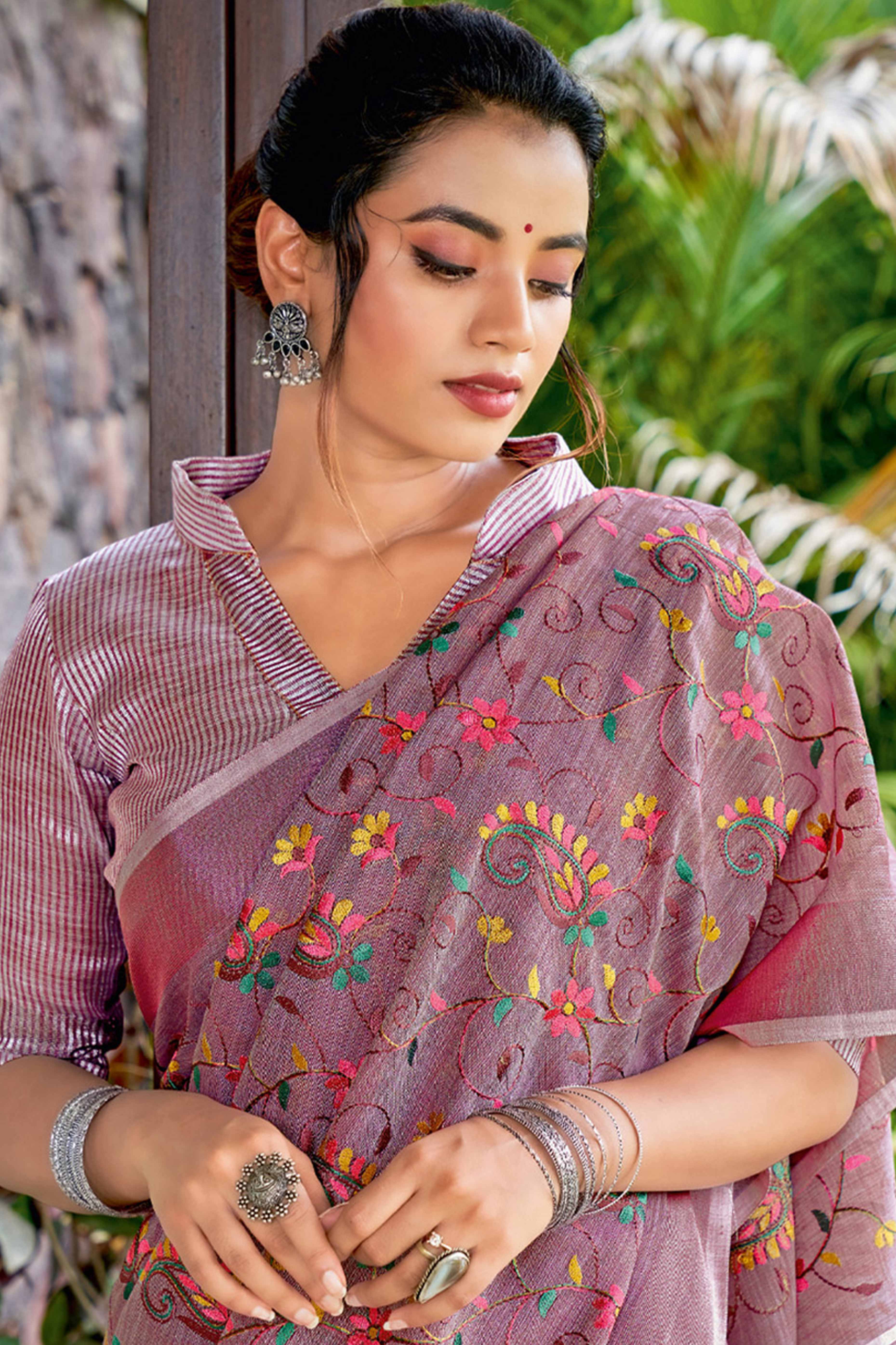Handwoven Mauve Linen Saree with Floral Embroidered Patterns