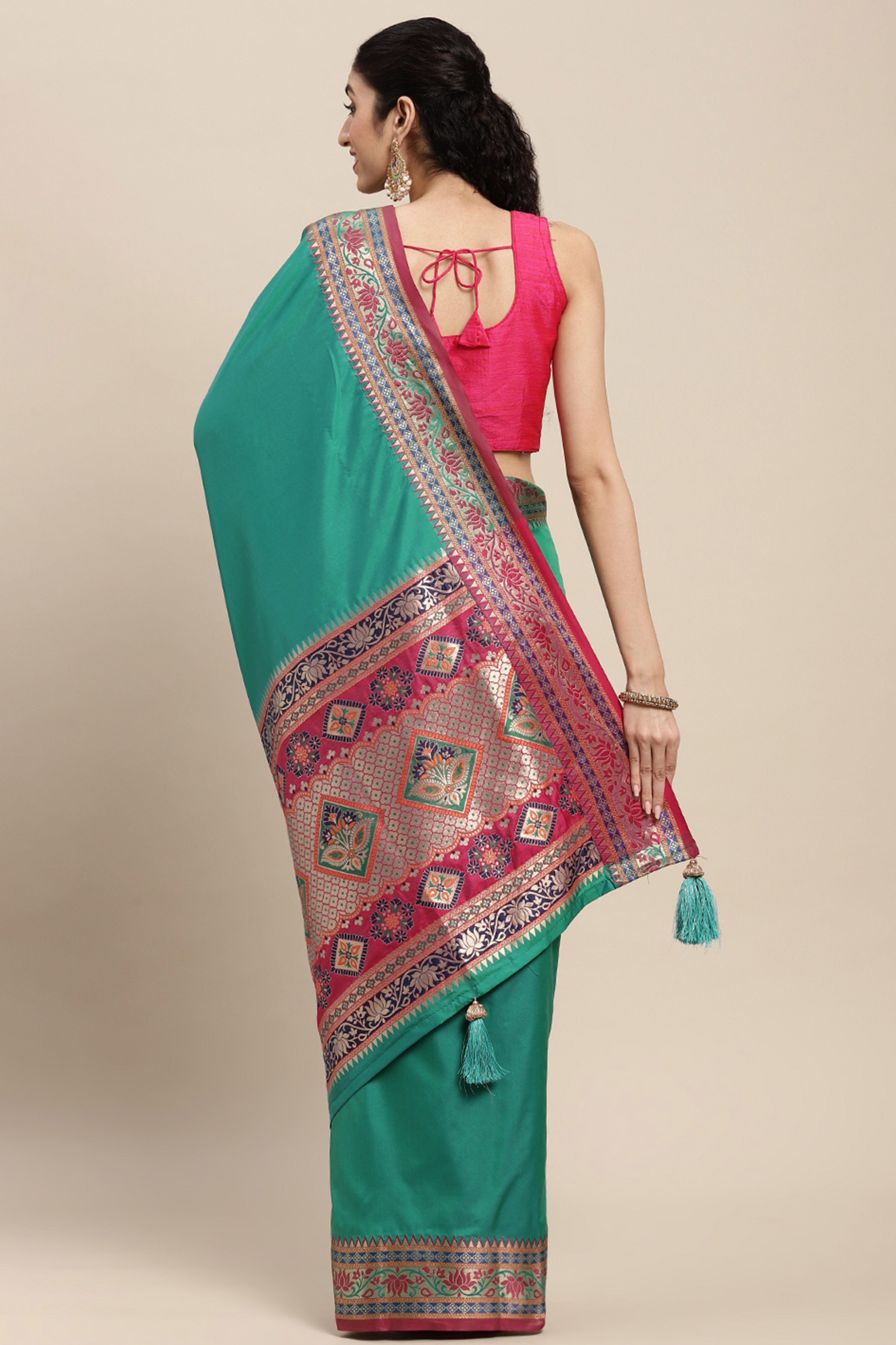 Graceful Rama Green Solid Saree Highlighted With Floral Zari Weaving On Silk Blend & Tassel Pallu
