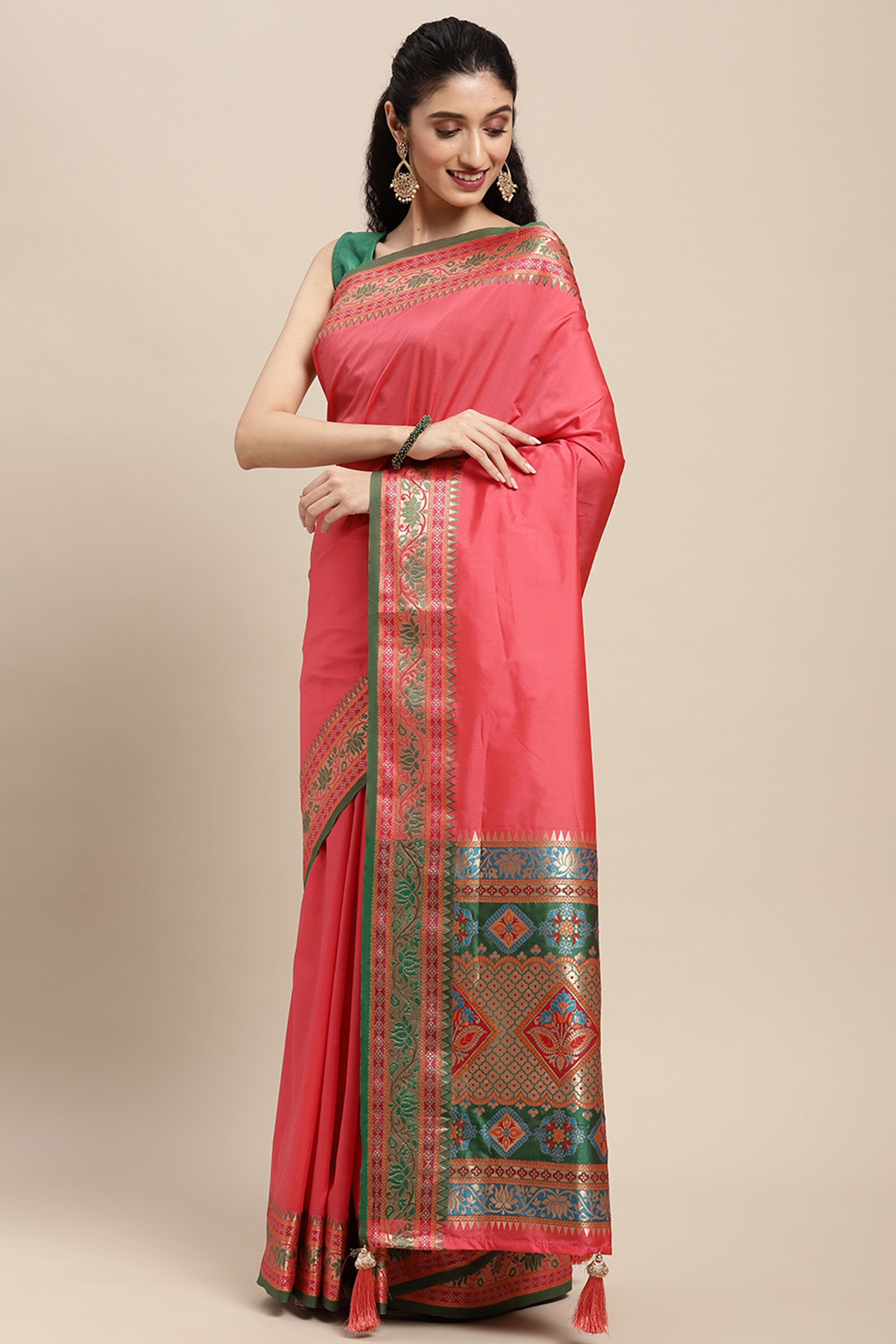 Graceful Gajari Pink Solid Saree Highlighted With Floral Zari Weaving On Silk Blend & Tassel Pallu