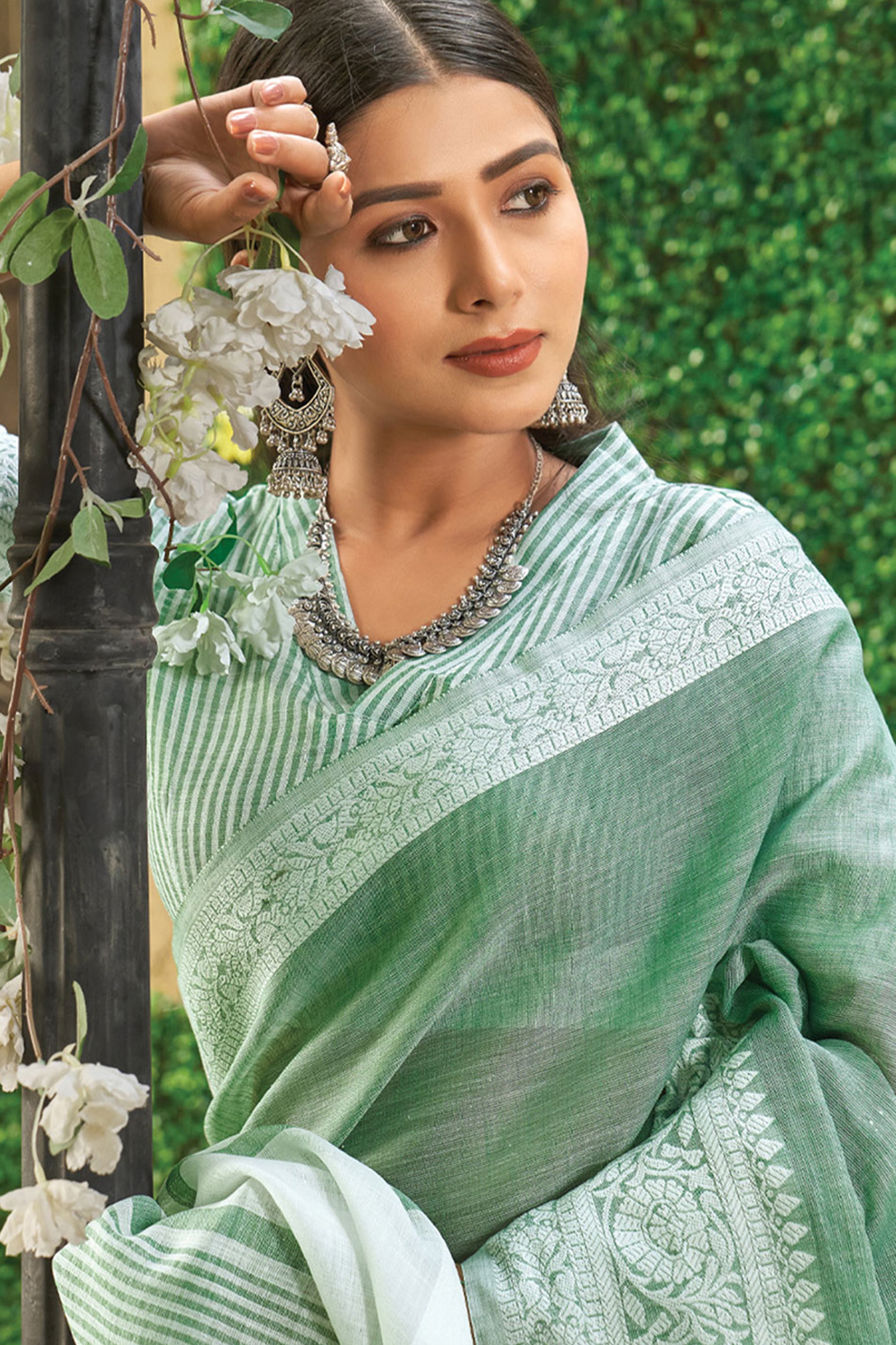 Rama Green Lightweight Linen Saree with Decorative Zari Border Weaving