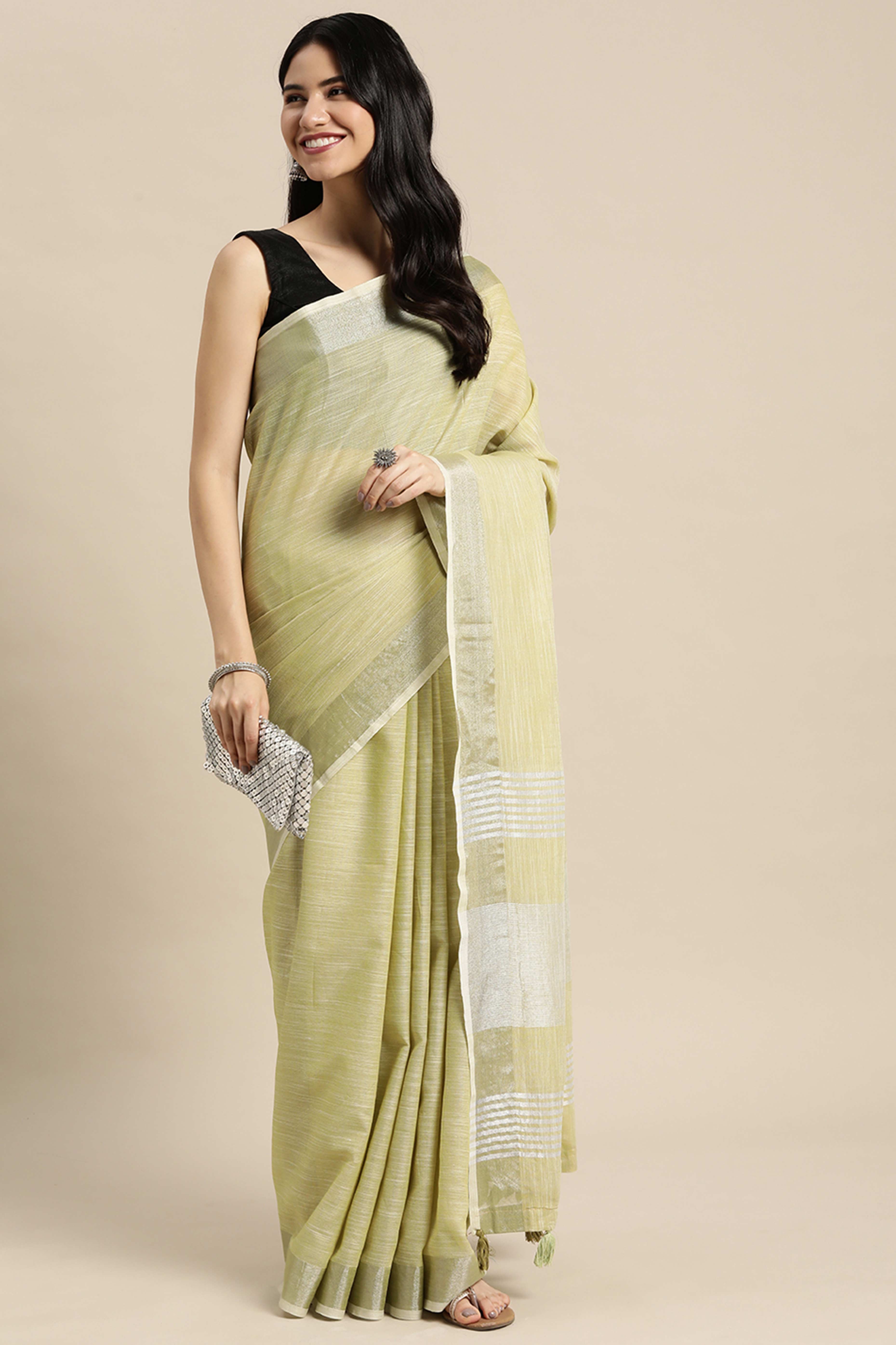 Olive Green Linen Saree Adorned With Silver Zari Weaving Border & Pallu