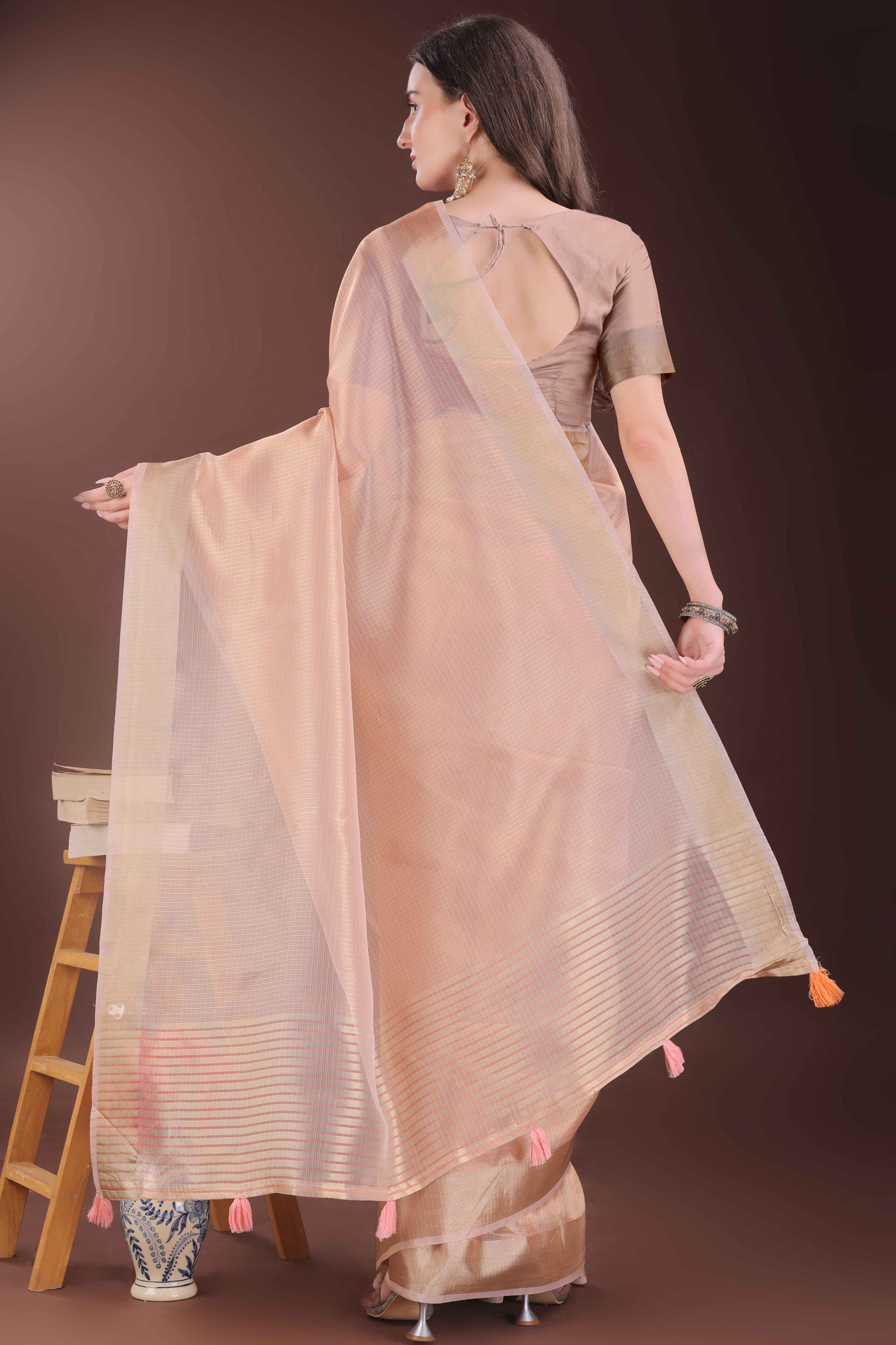 Peach Zari Woven Organza Saree With Graceful Tassel Border
