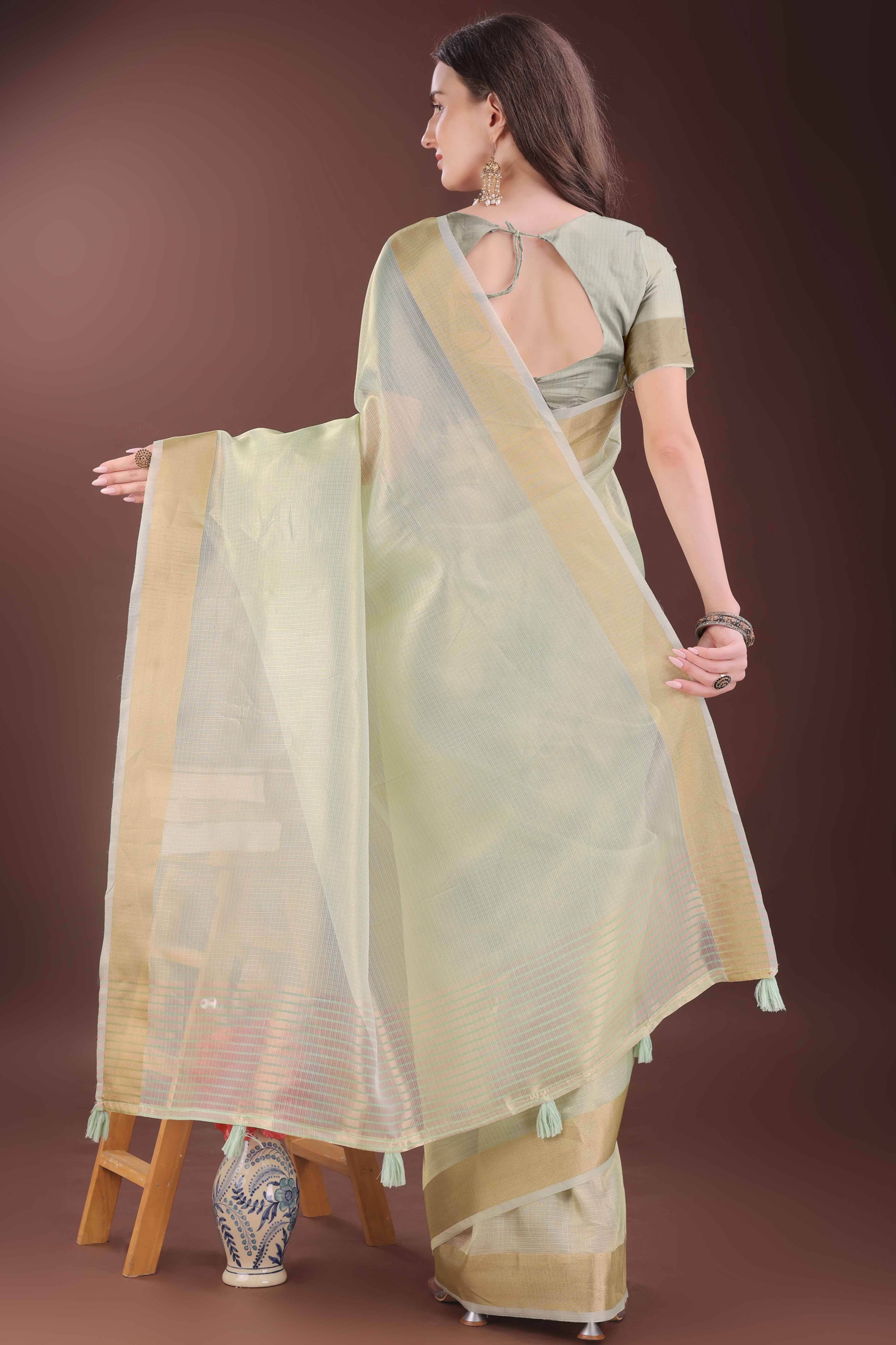 Light Green Zari Woven Organza Saree With Graceful Tassel Border