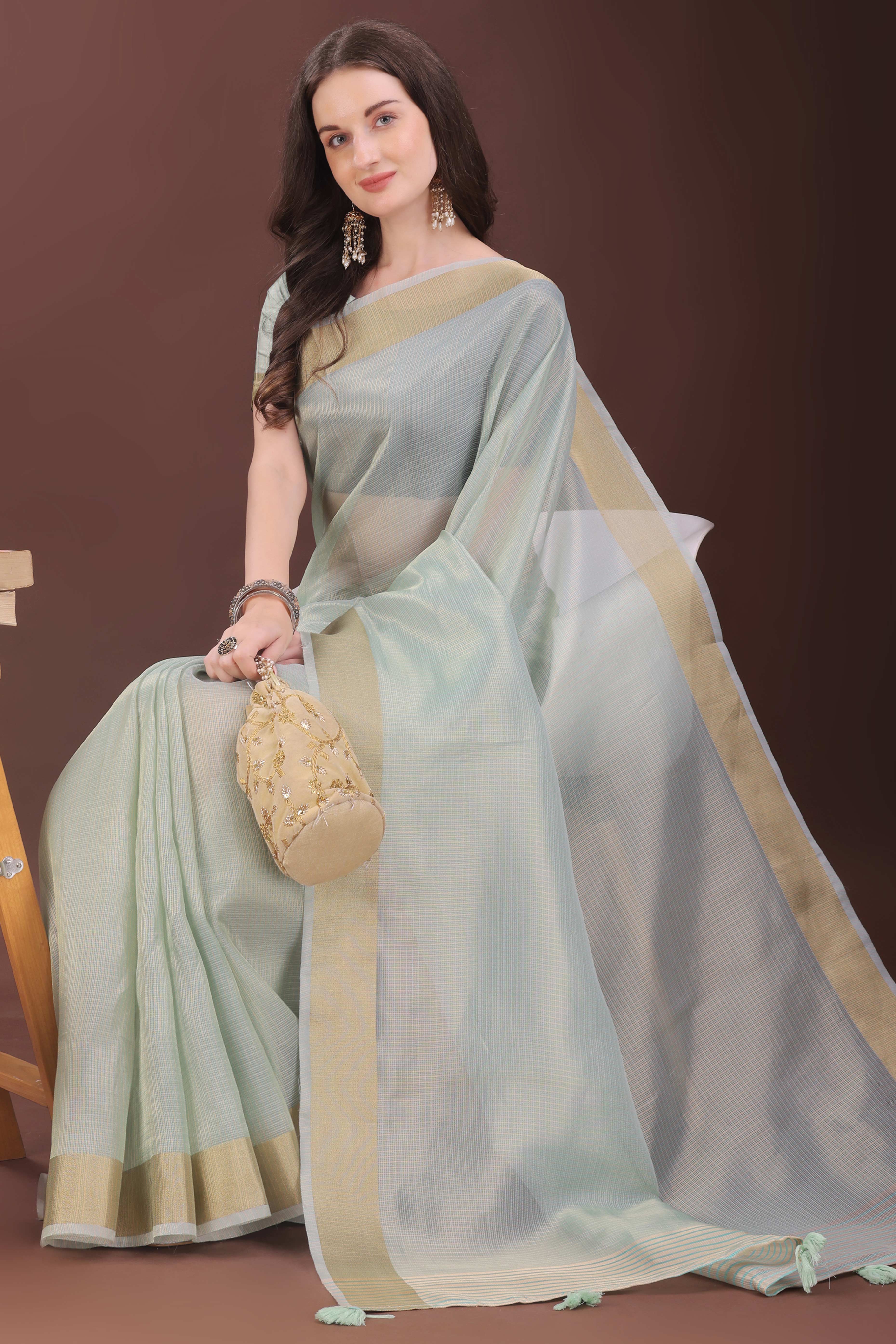 Sea Green Zari Woven Organza Saree With Graceful Tassel Border