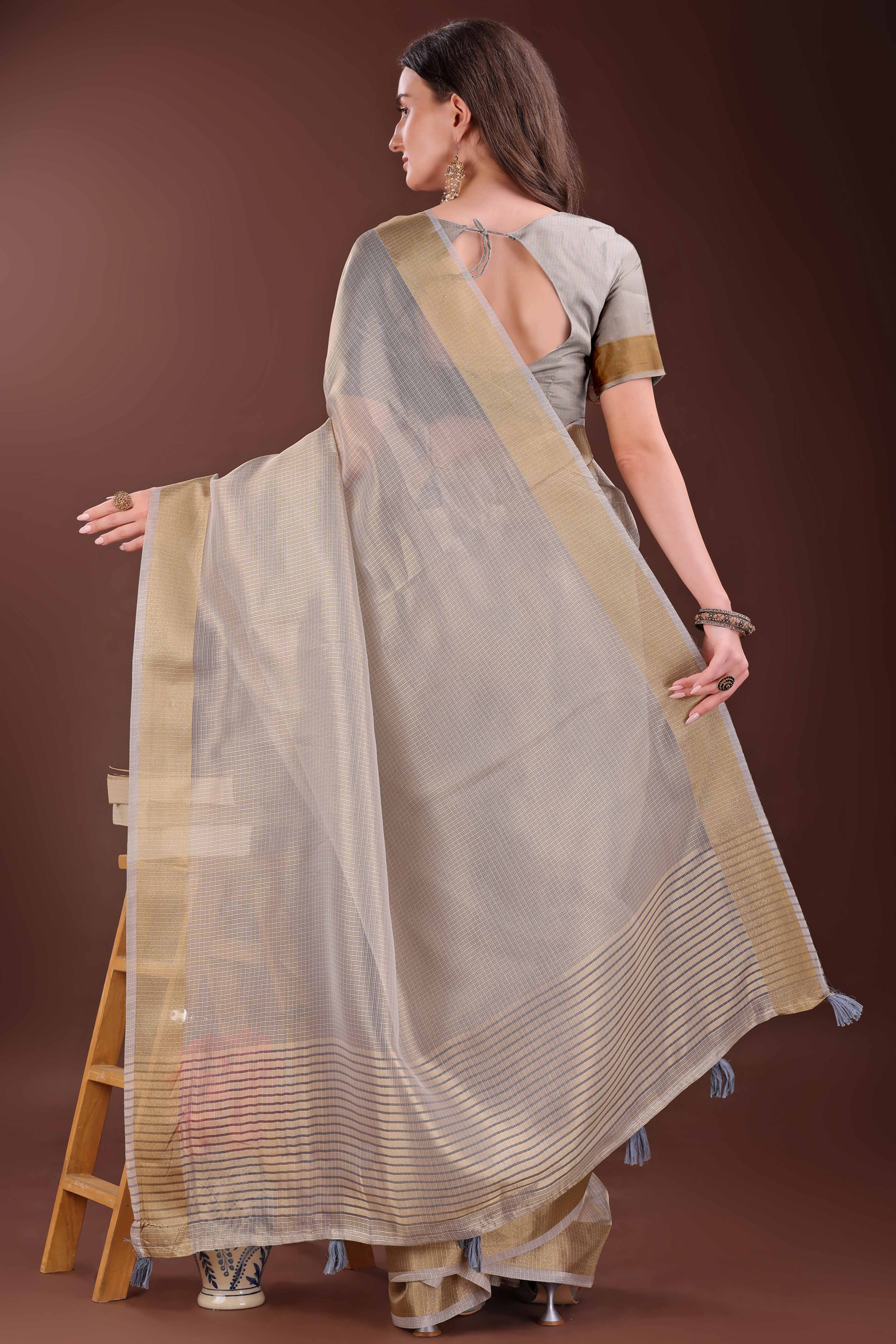 Light Brown Zari Woven Organza Saree With Graceful Tassel Border