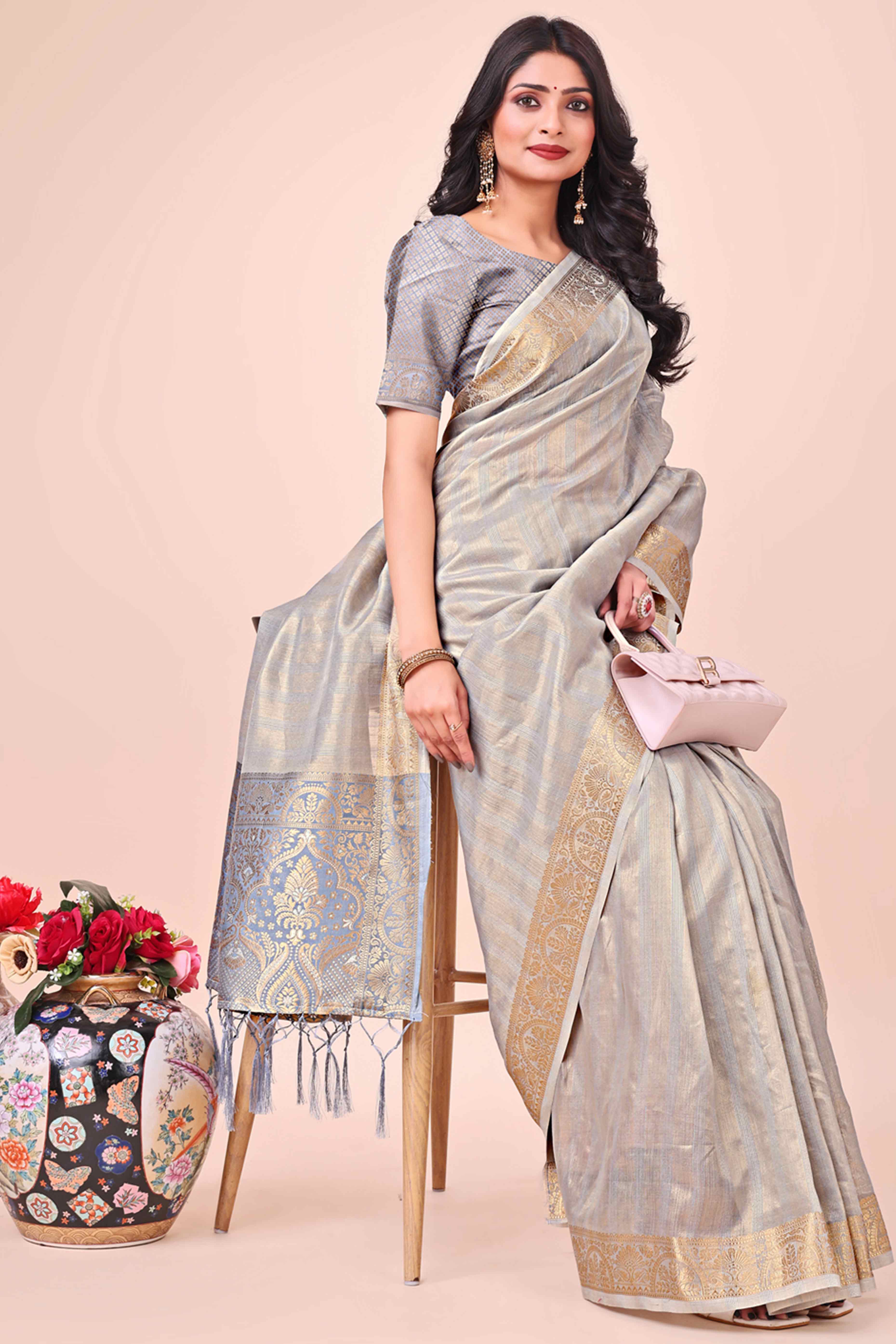 Grey Organza Saree With Floral Zari Weave & Tassel Accents