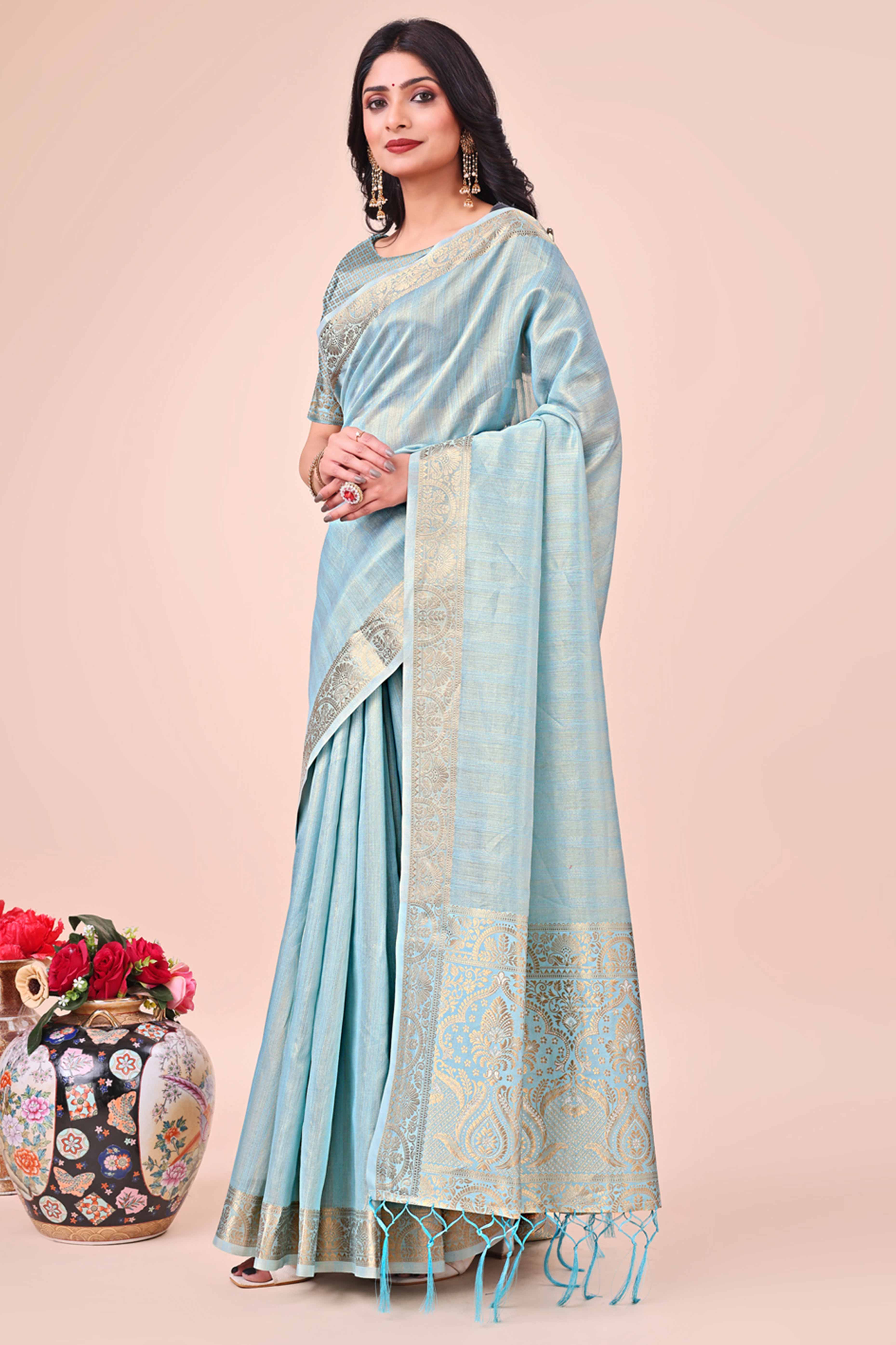 Sky Blue Organza Saree With Floral Zari Weave & Tassel Accents