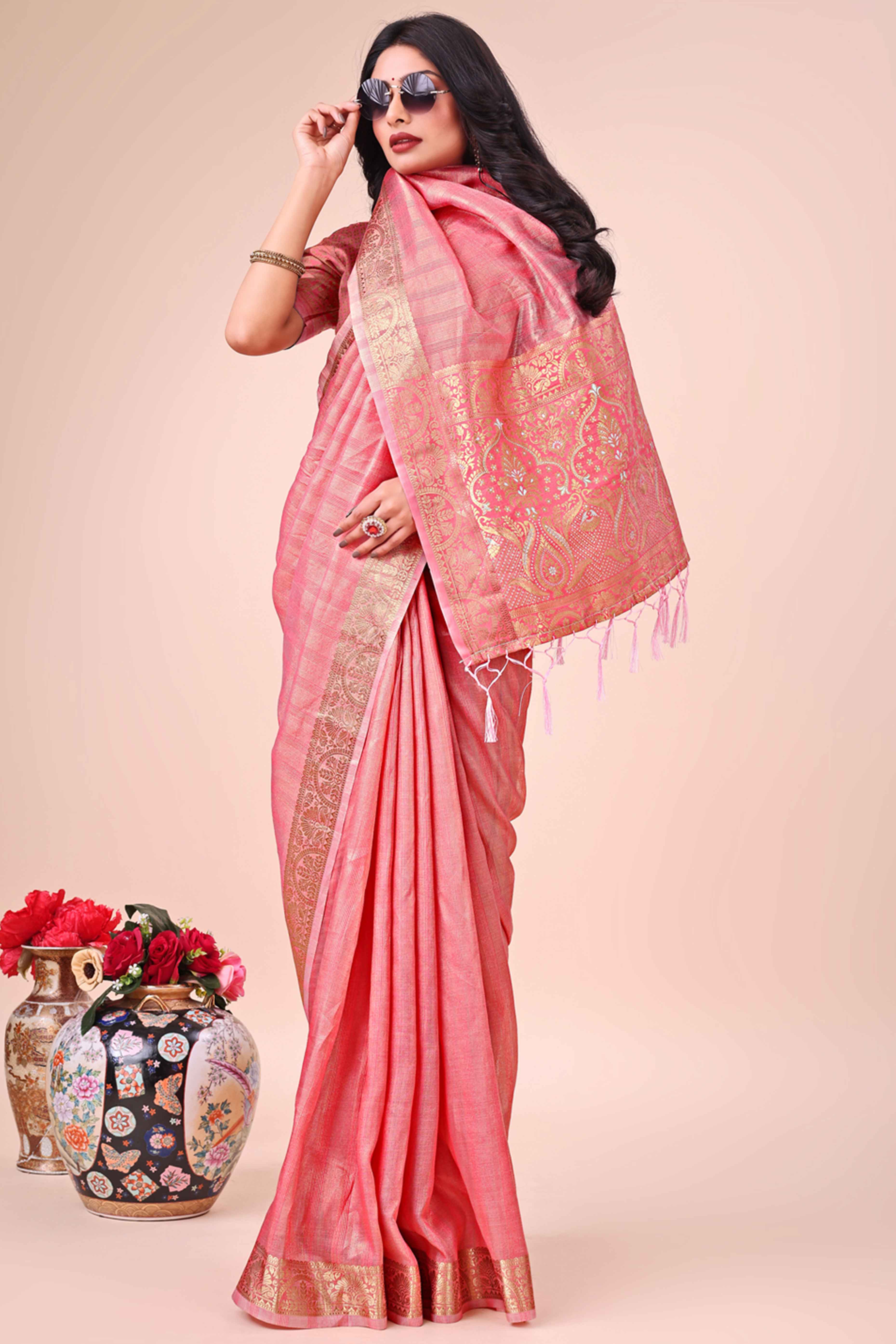 Peach Organza Saree With Floral Zari Weave & Tassel Accents
