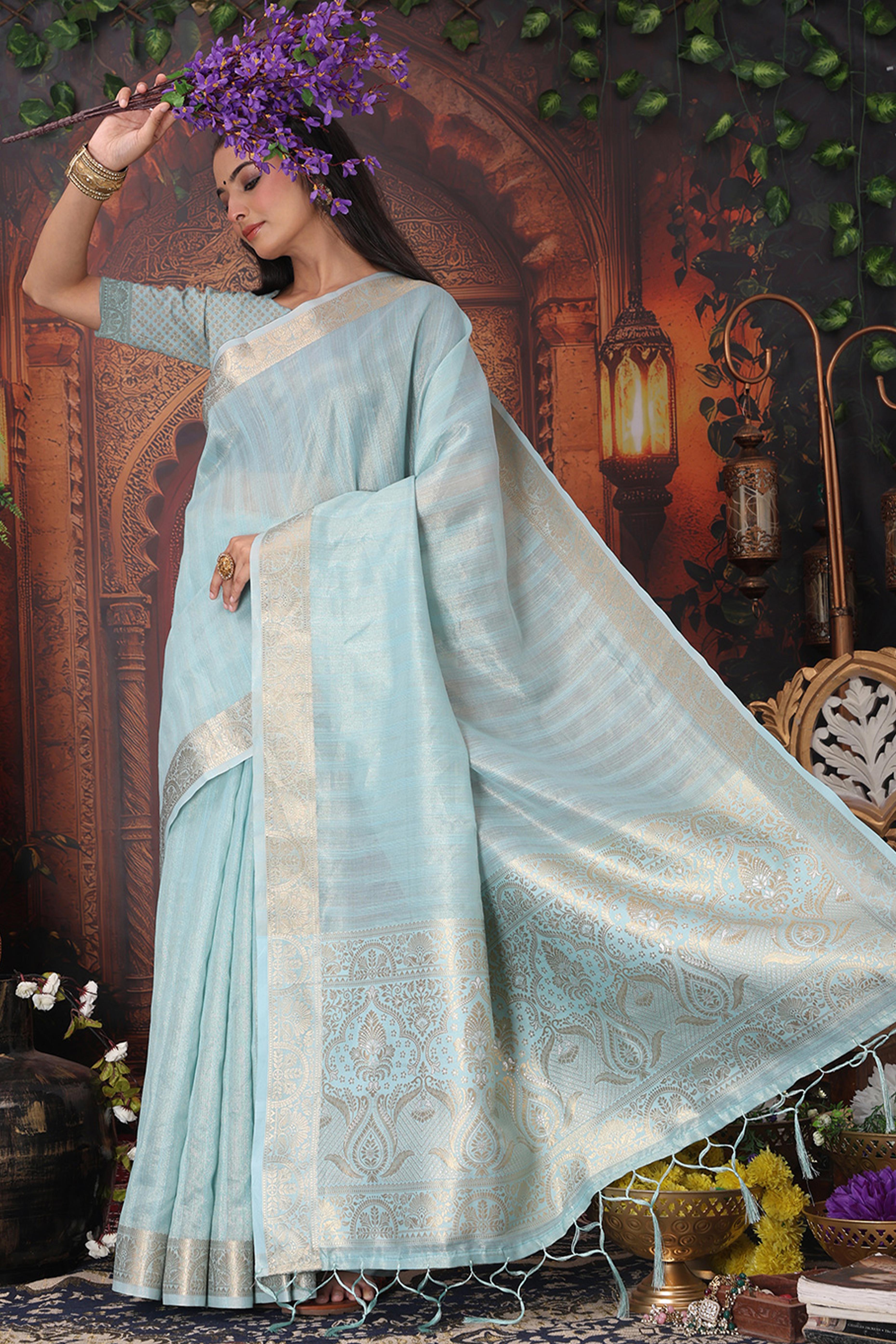 Sky Blue Organza Saree Adorned With Floral Zari Weaving & Graceful Tassel Pallu