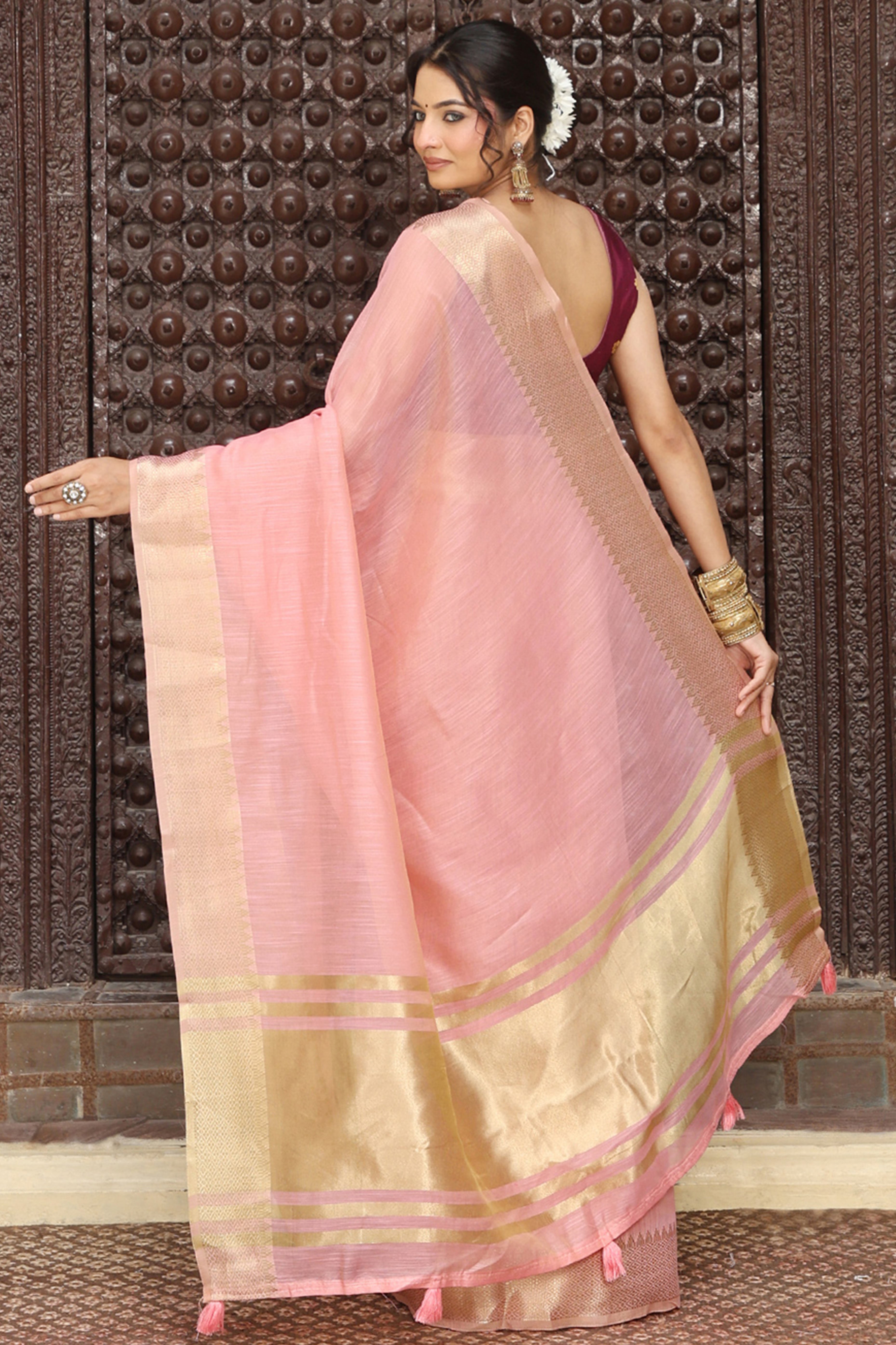 Trendy Pink Cotton Blend Saree Showcasing Elegant Zari Weaving & Tassel Border Pallu