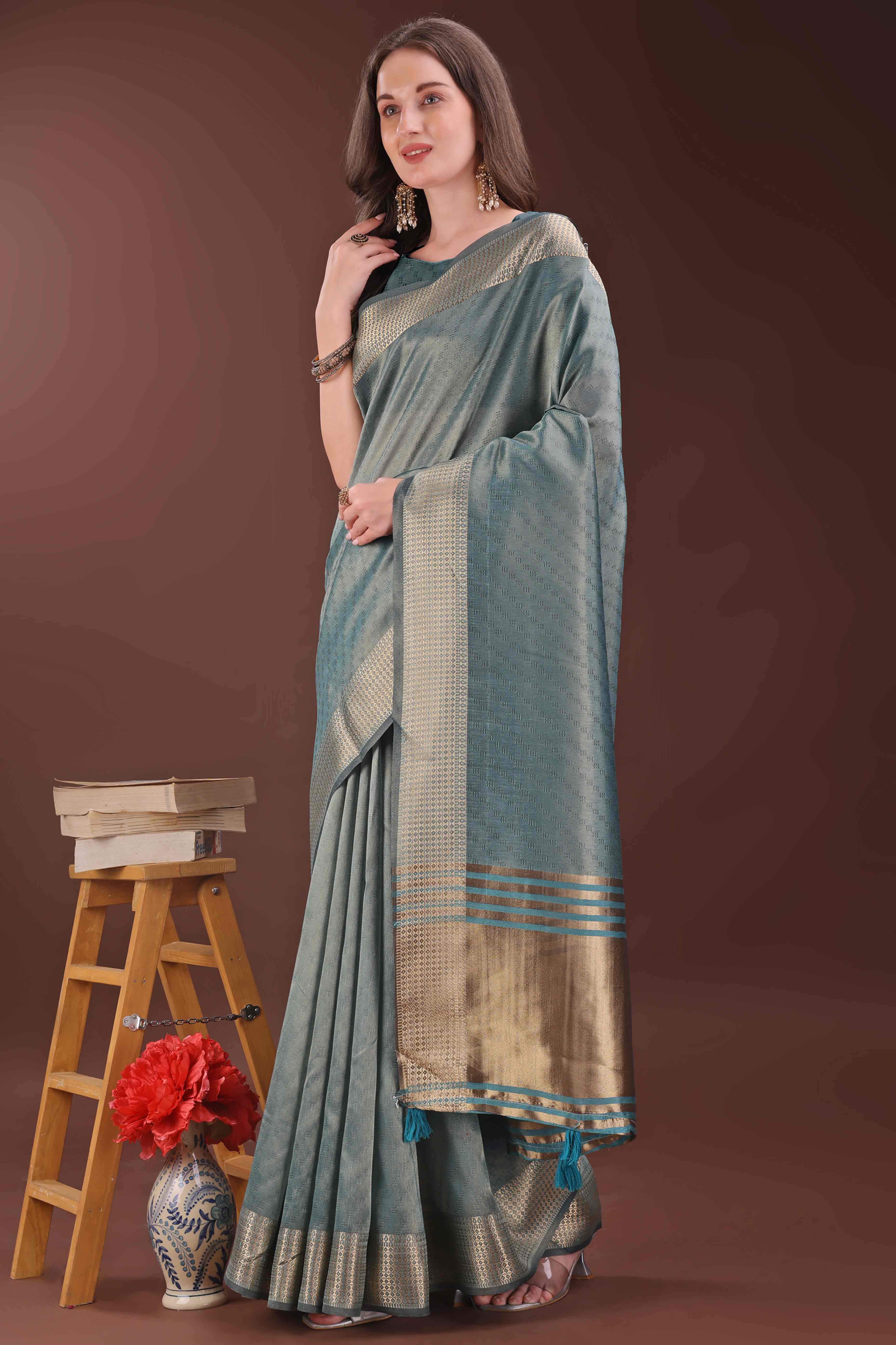 Peacock Blue Zari Weaving Organza Saree With Tassel Border