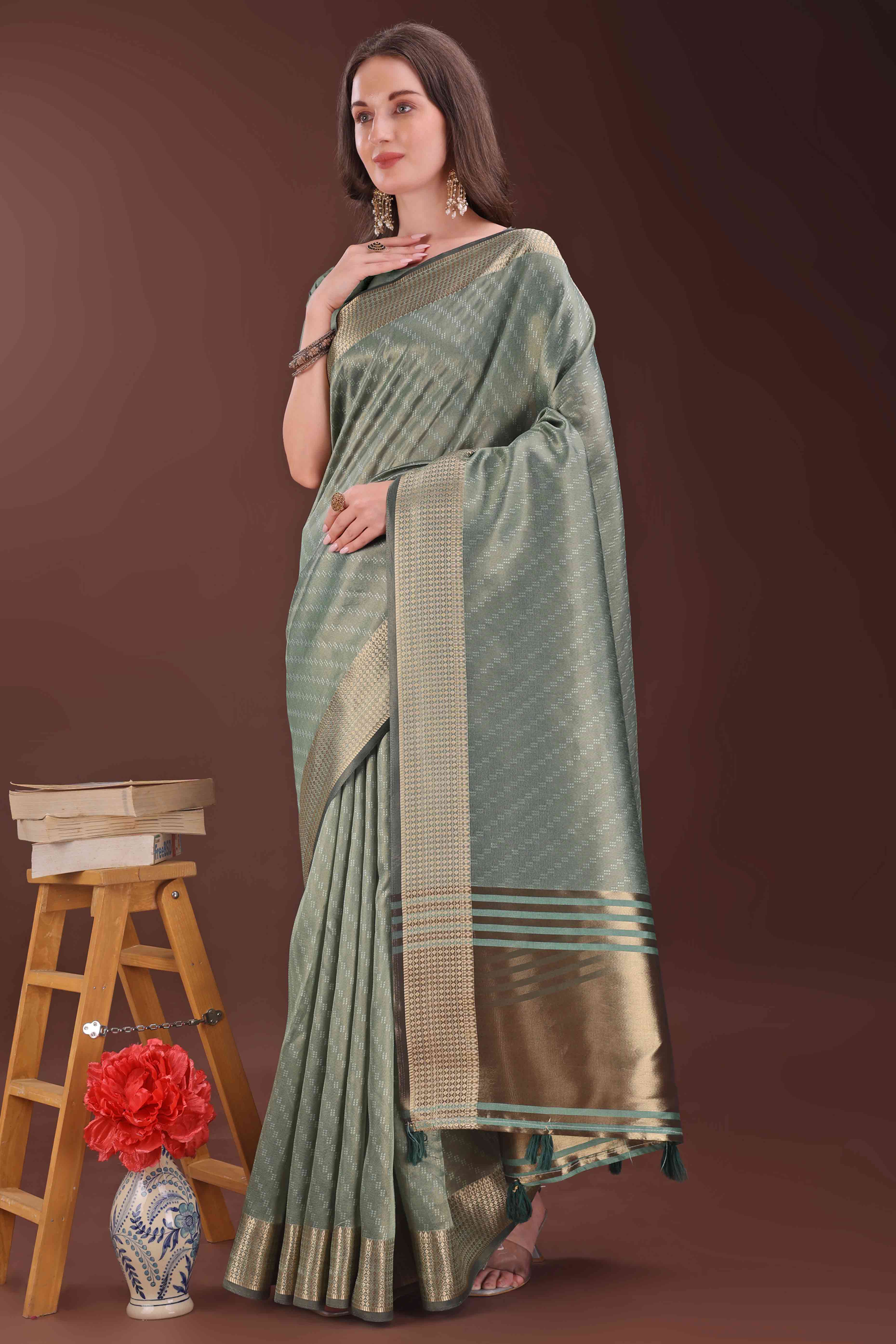 Green Zari Weaving Organza Saree With Tassel Border