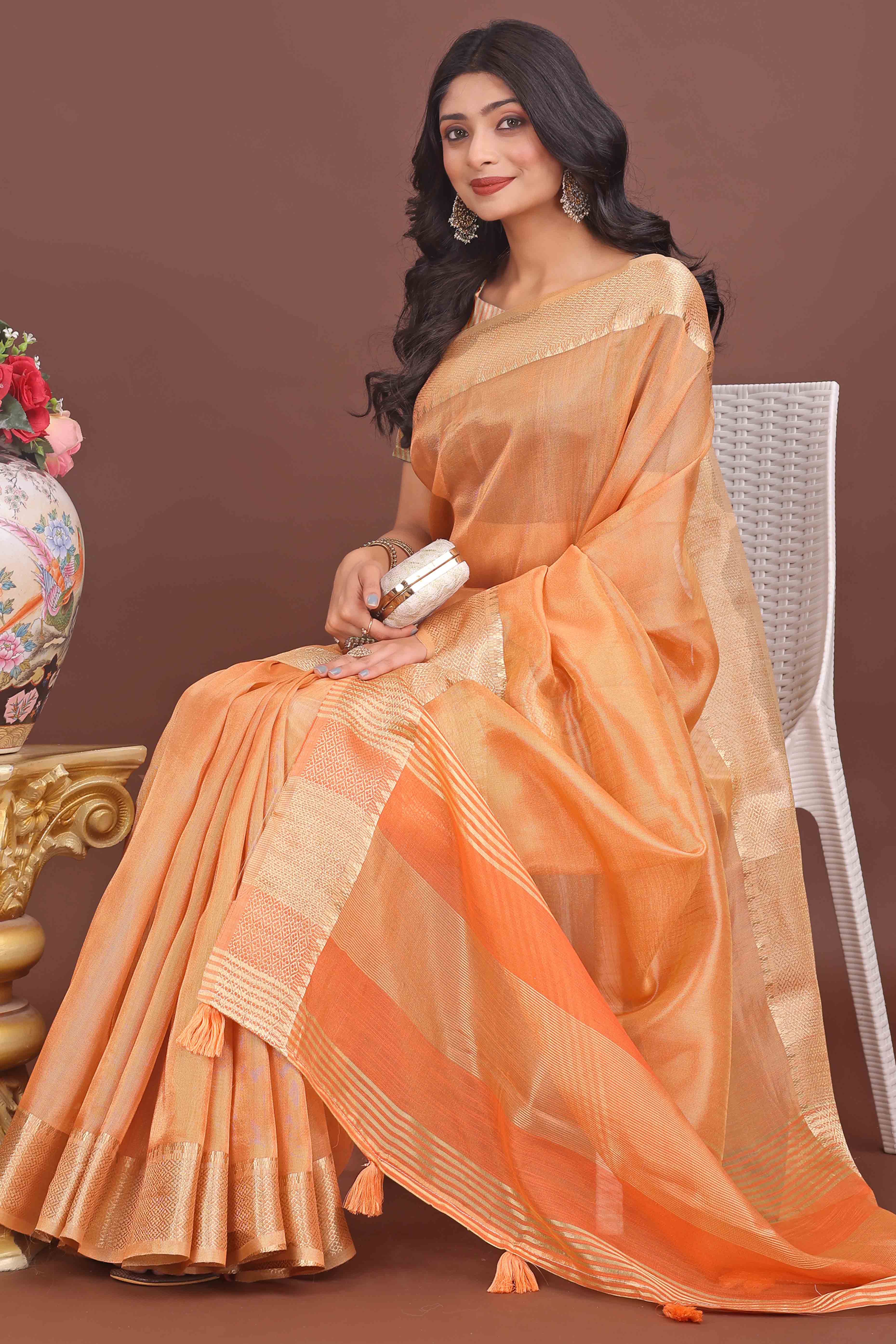Orange Solid With Zari Woven Organza Saree With Tassel Border