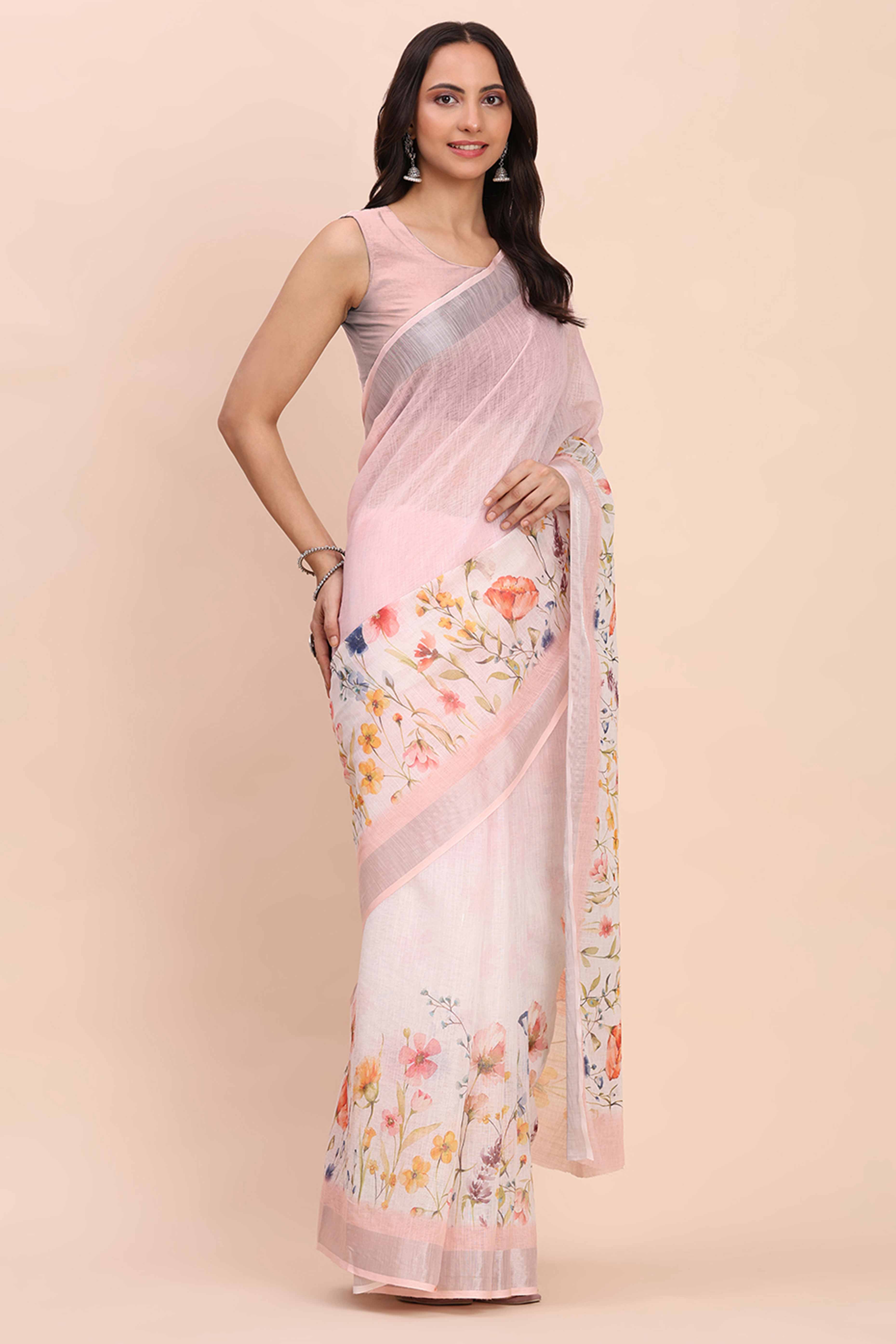 Light Pink Linen Cotton Saree Featuring Floral Prints & Woven Border