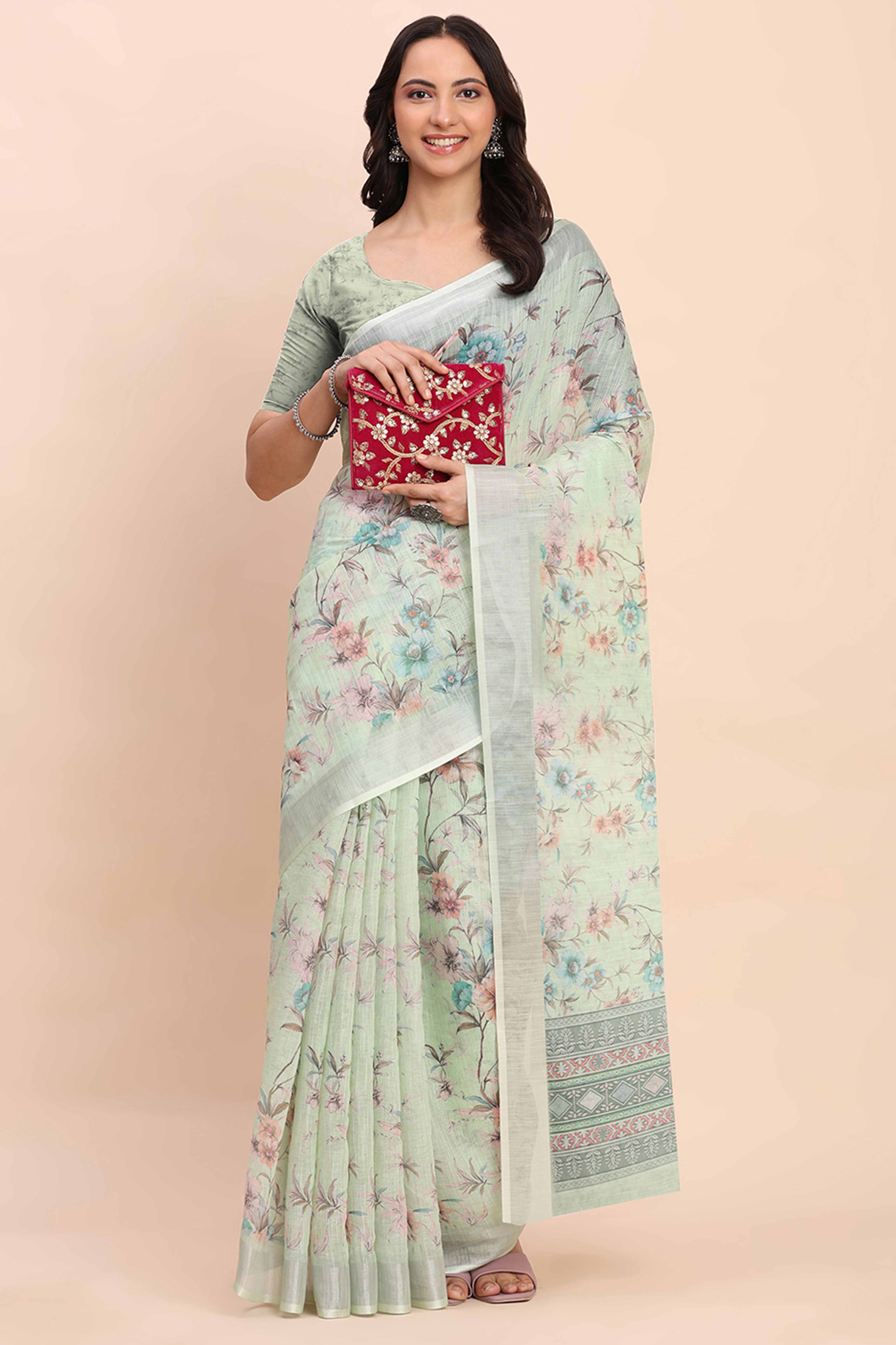 Light Green Linen Cotton Saree Featuring Floral Prints & Woven Border