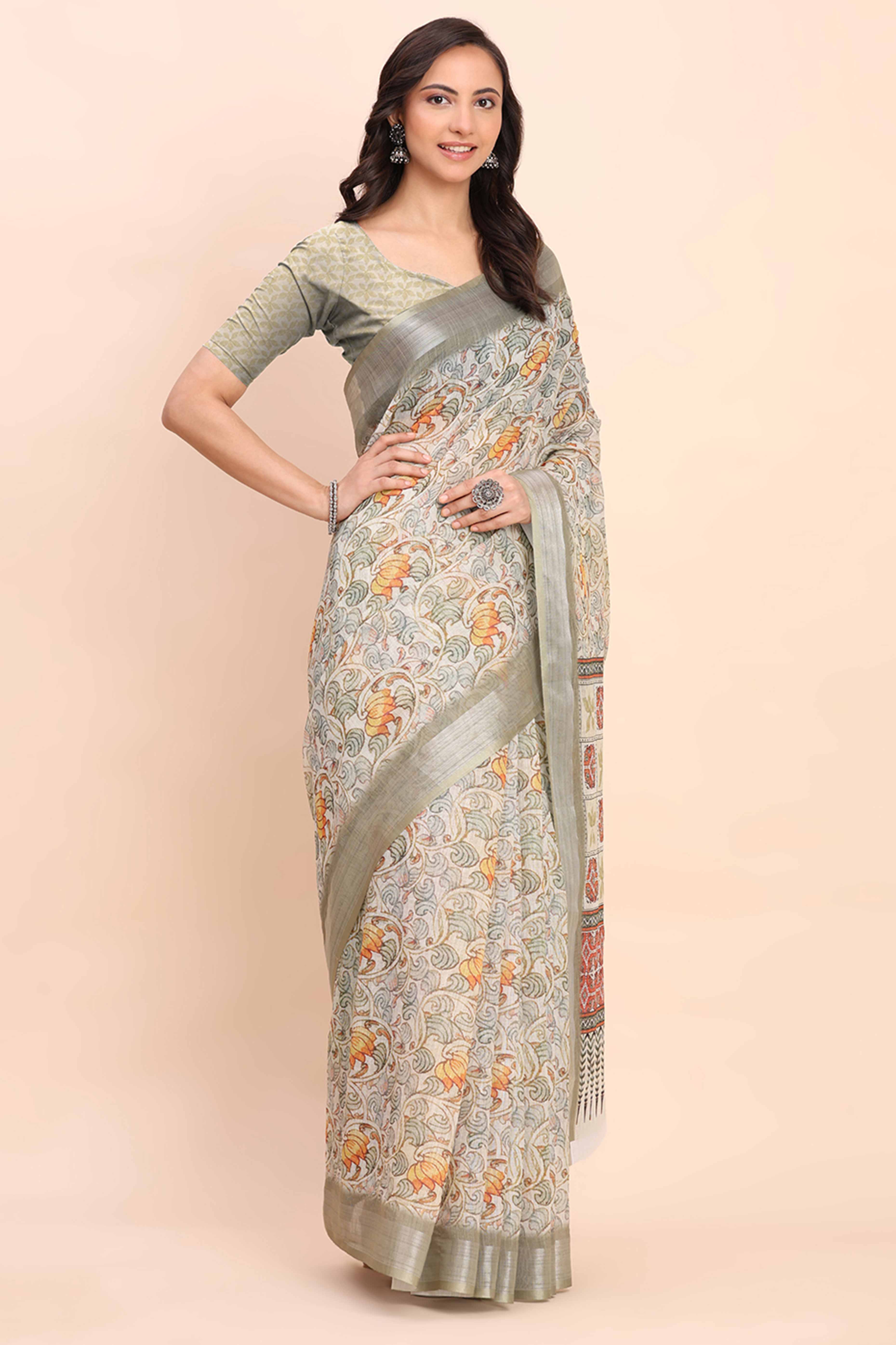 Light Green Linen Cotton Saree Featuring Floral Prints & Woven Border