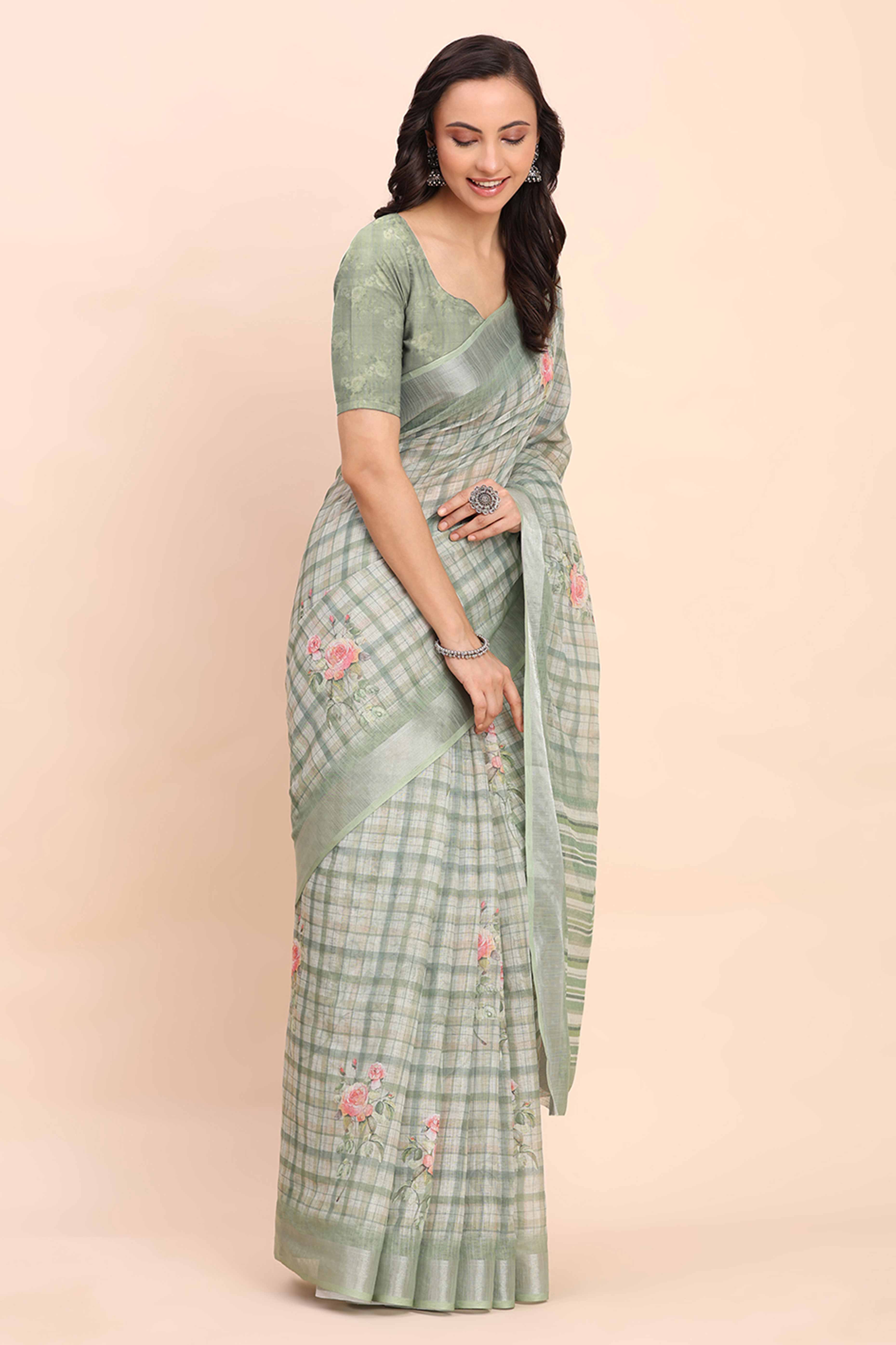 Sea Green Linen Cotton Saree Featuring Floral Prints & Woven Border