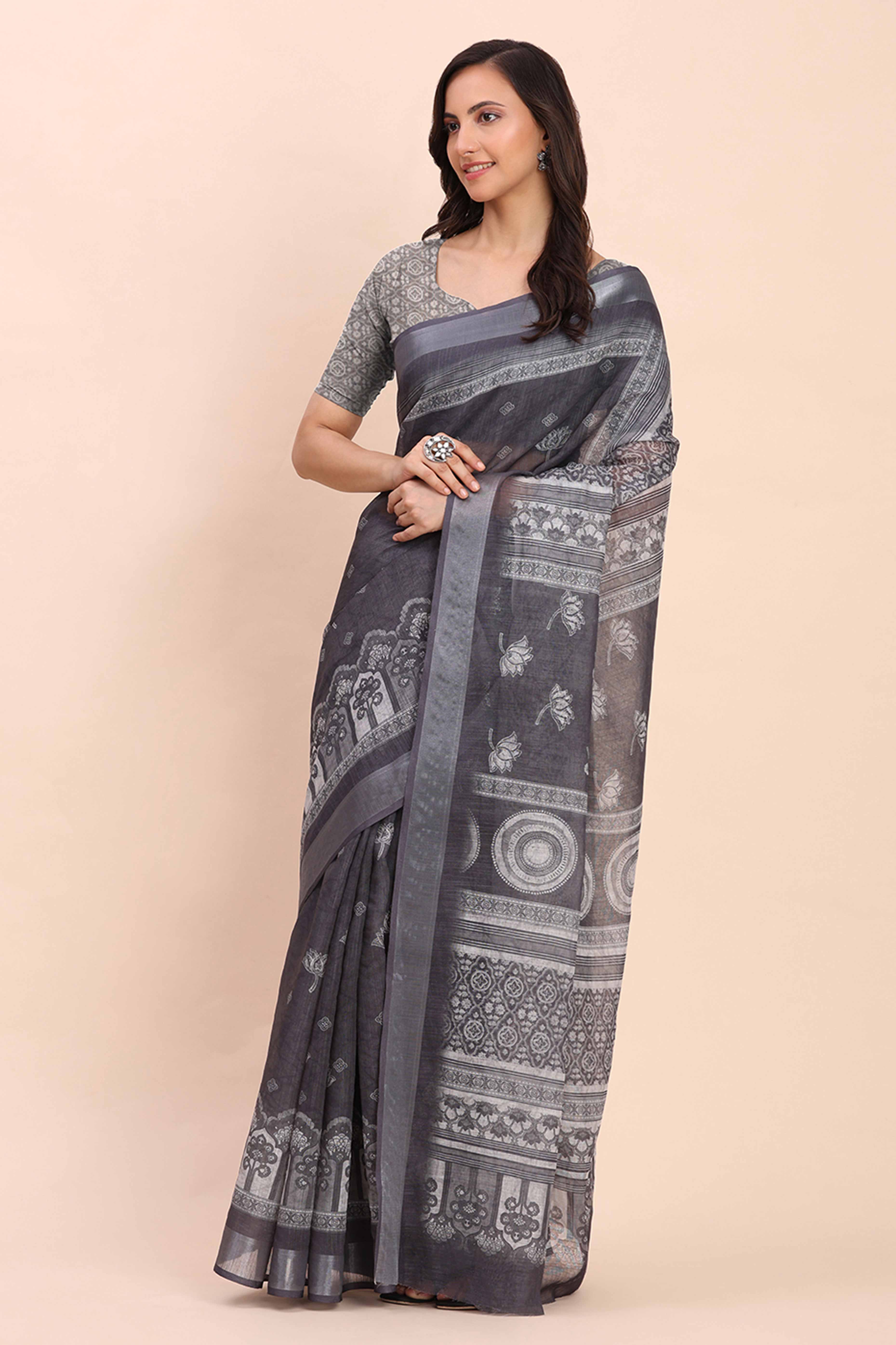 Grey Linen Saree with Intricate Silver Weaving