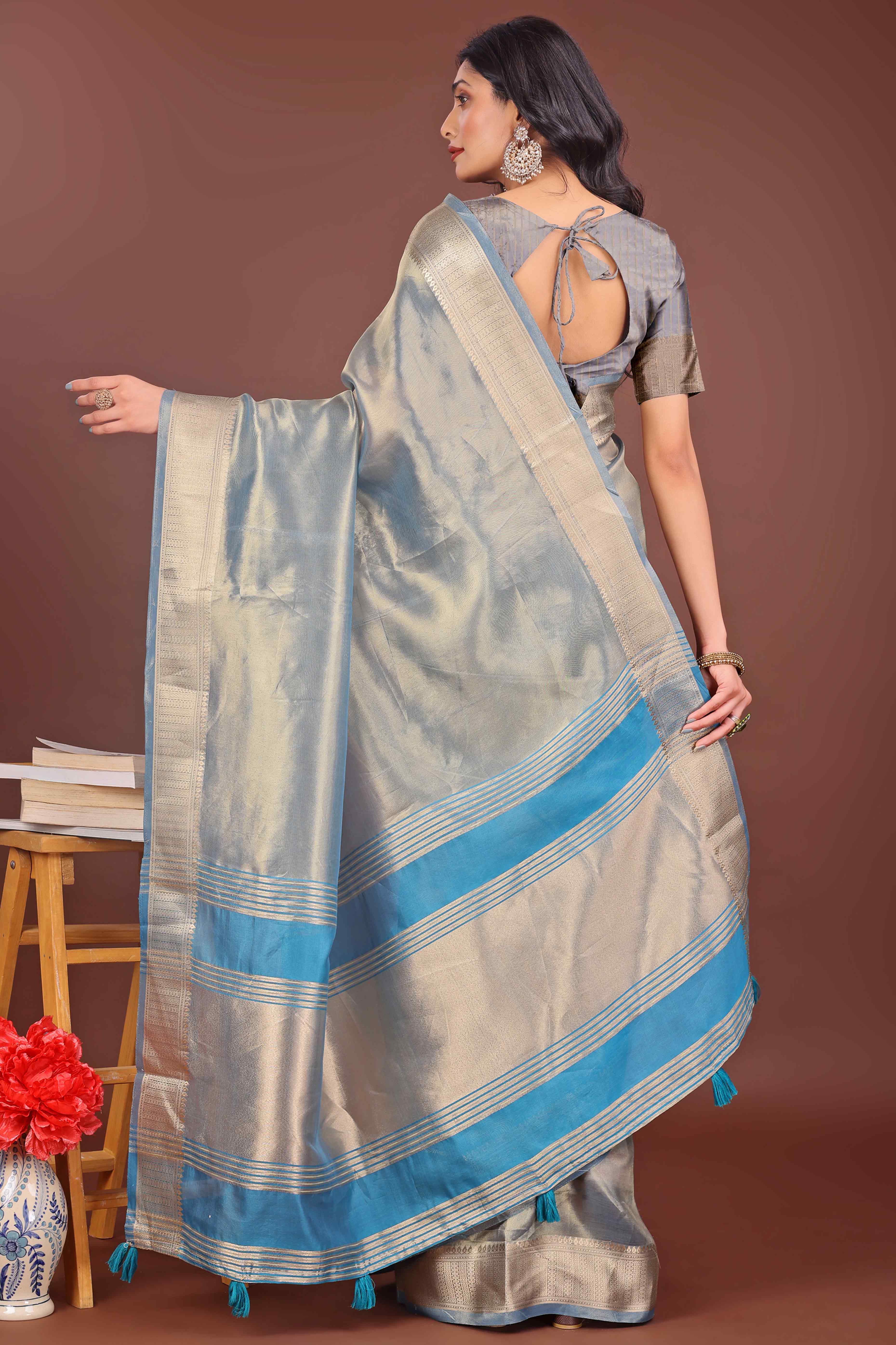 Greyish Blue Organza Solid Saree With Lustrous Zari Weave &  Delicate Tassels