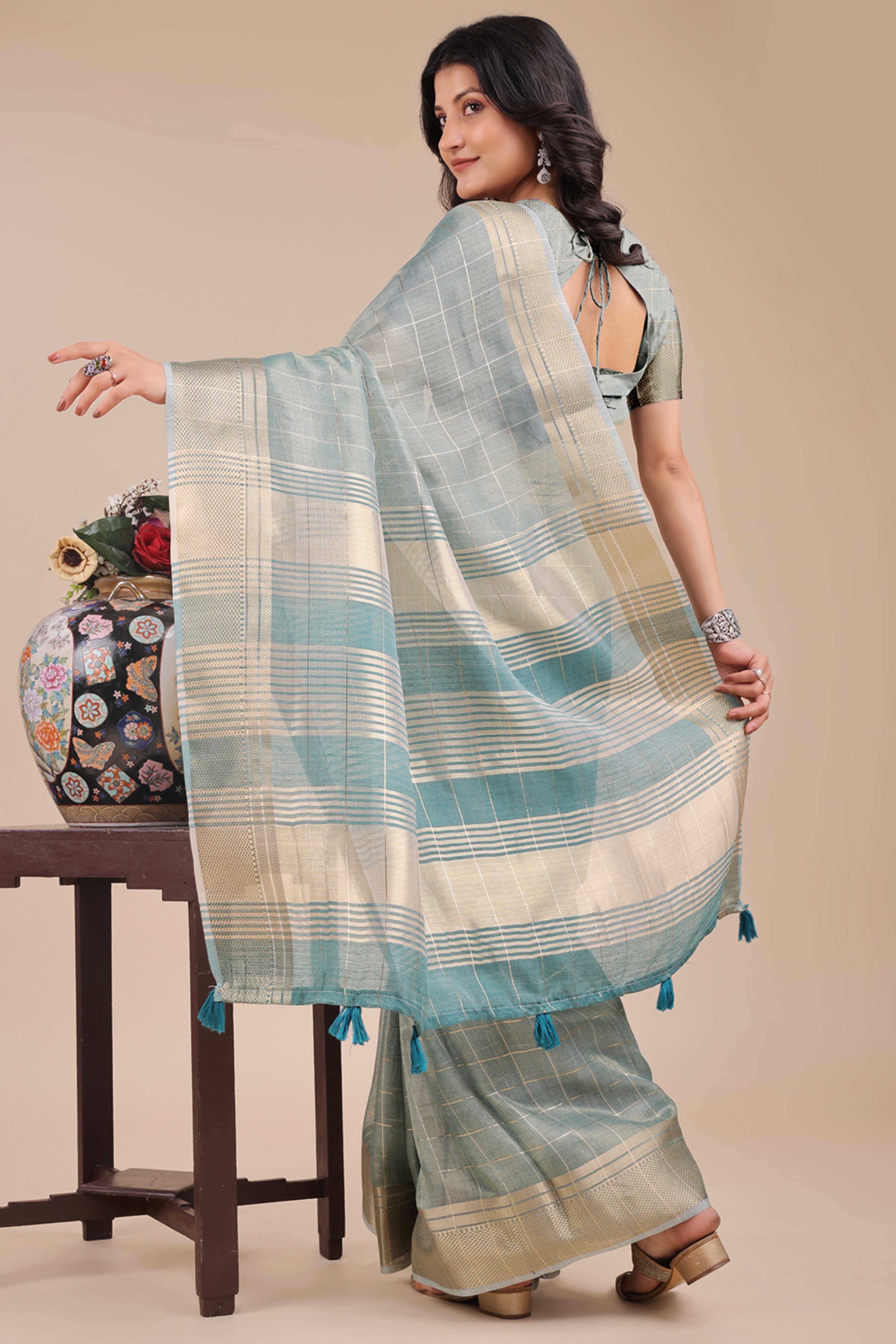 Sea Green Organza Saree with Checkered Zari Weaving Pattern and Tassels