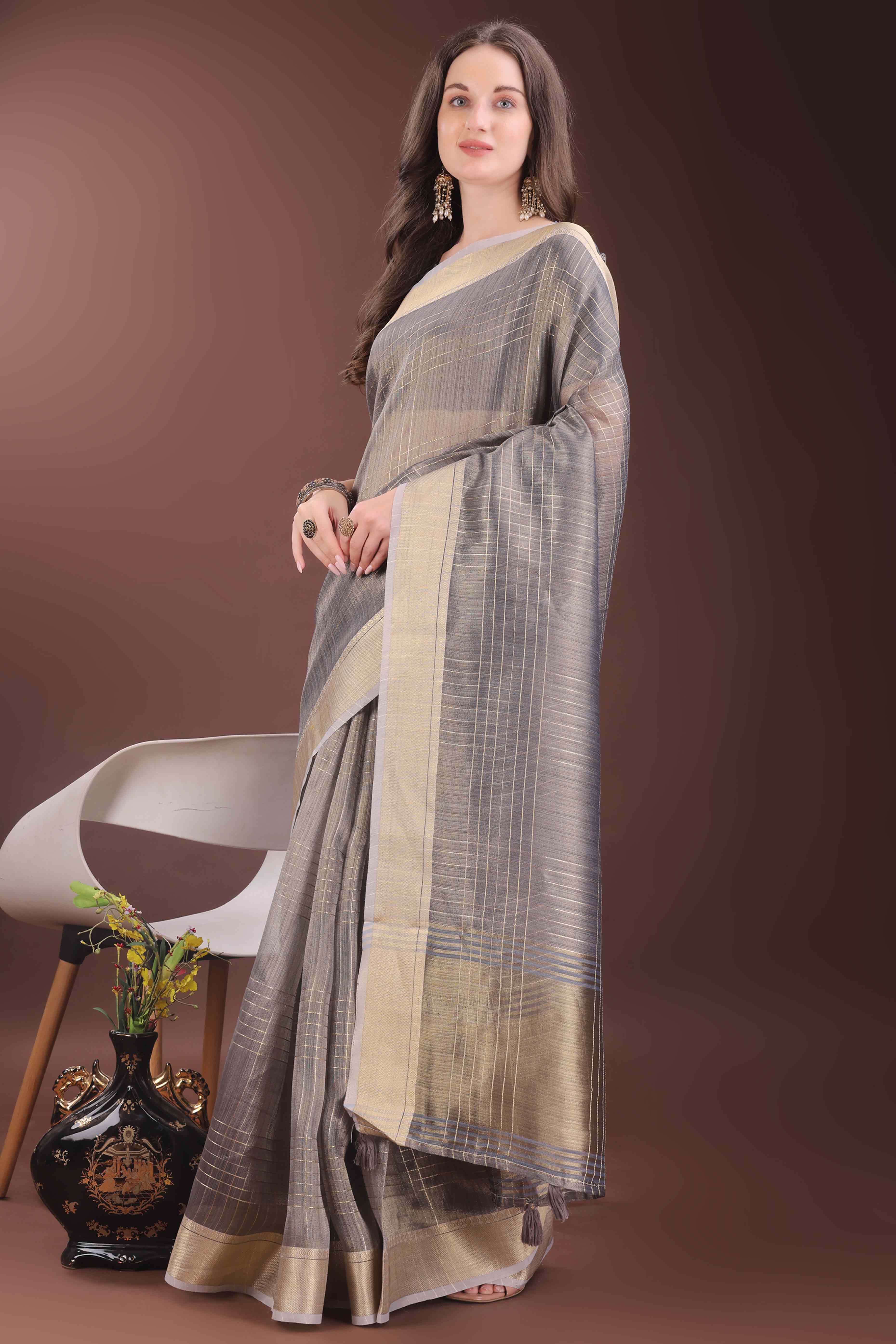 Grey Organza Saree With Zari Weaving Check Patterns & Elegant Tassel Accents
